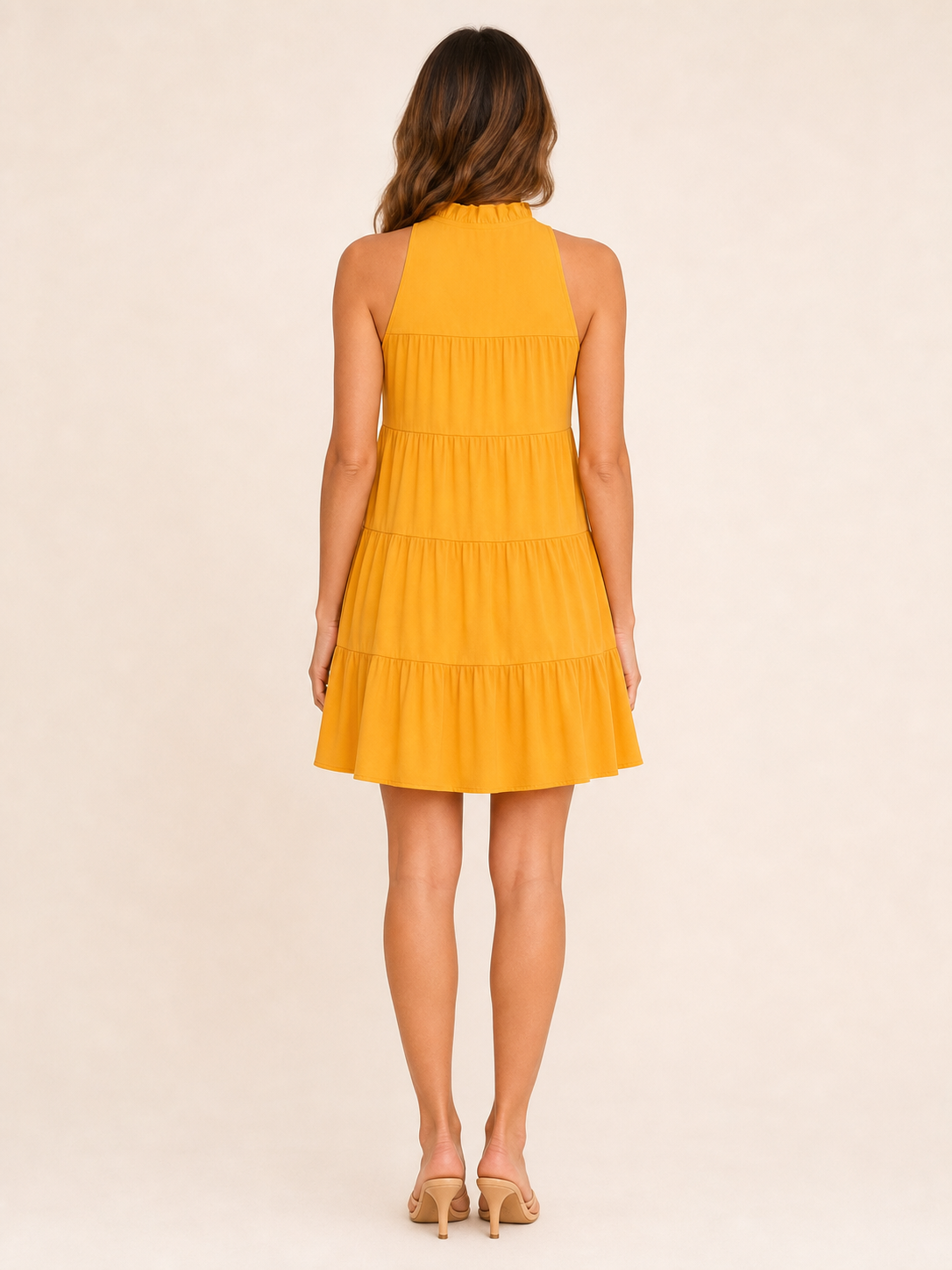 Women's mustard ruffled mock neck tiered mini dress back view