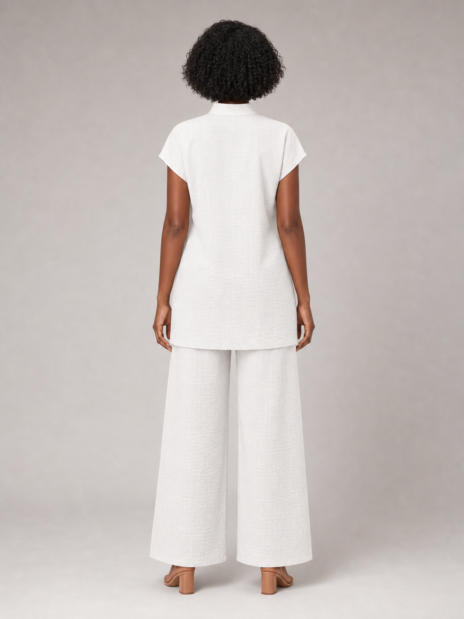 Women's ivory mock-neck asymmetric tunic and wide-leg pants set back view