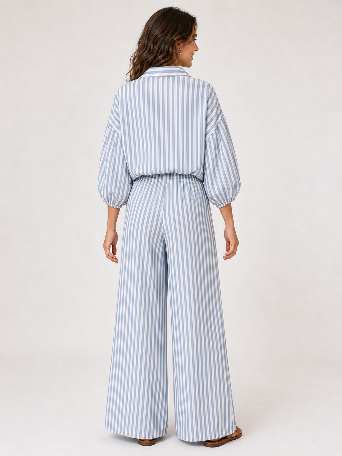 Women's striped shirt and wide leg pants set back view