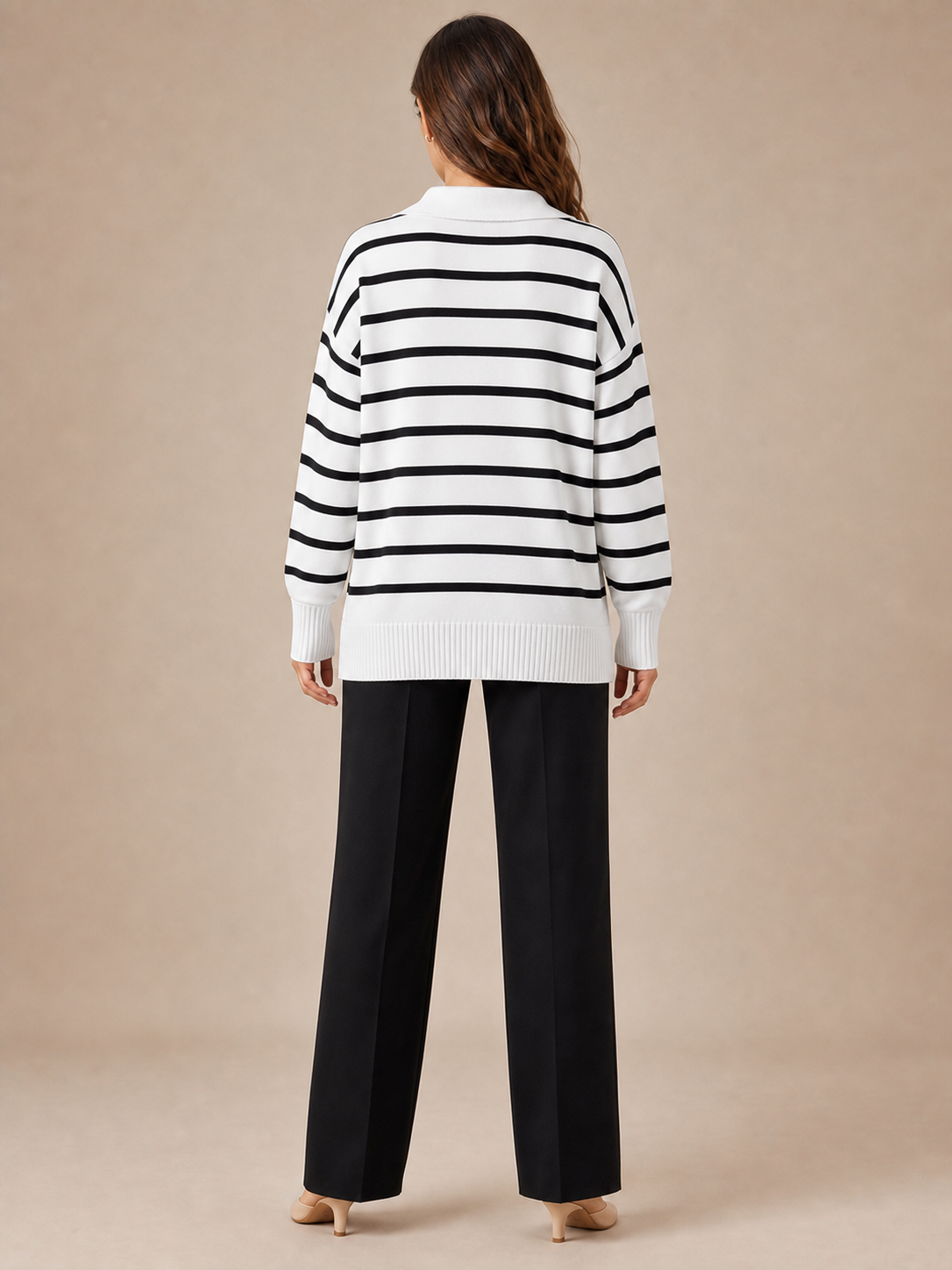 Back view of women's black and white striped collared knit top