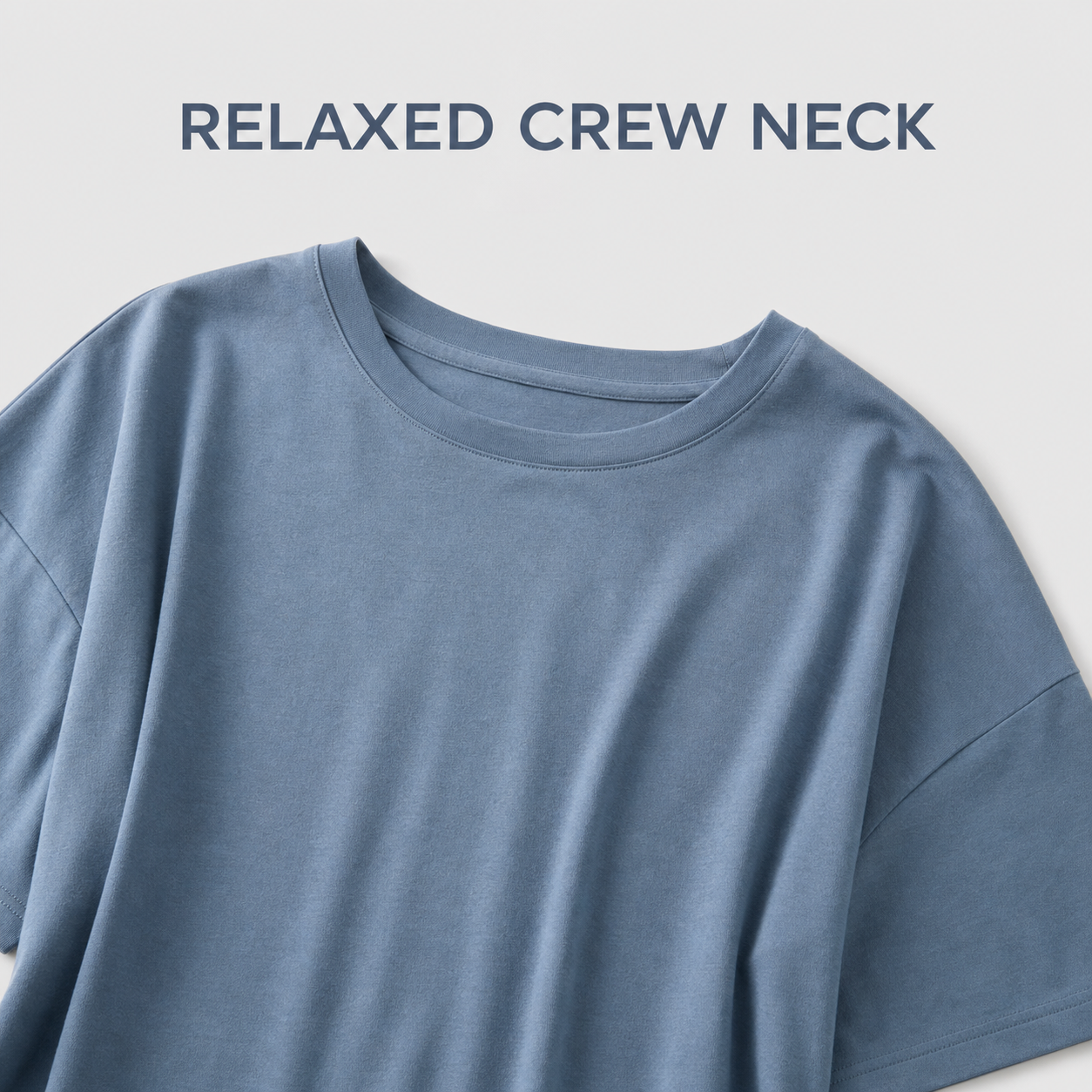 Relaxed crew neck and dropped shoulder construction detail