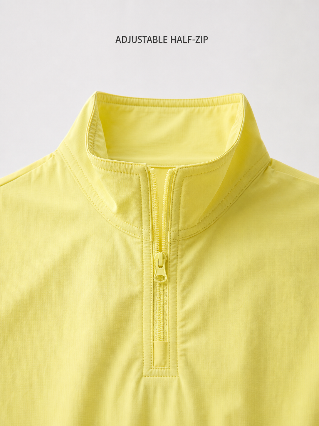 Adjustable half-zip collar structure detail