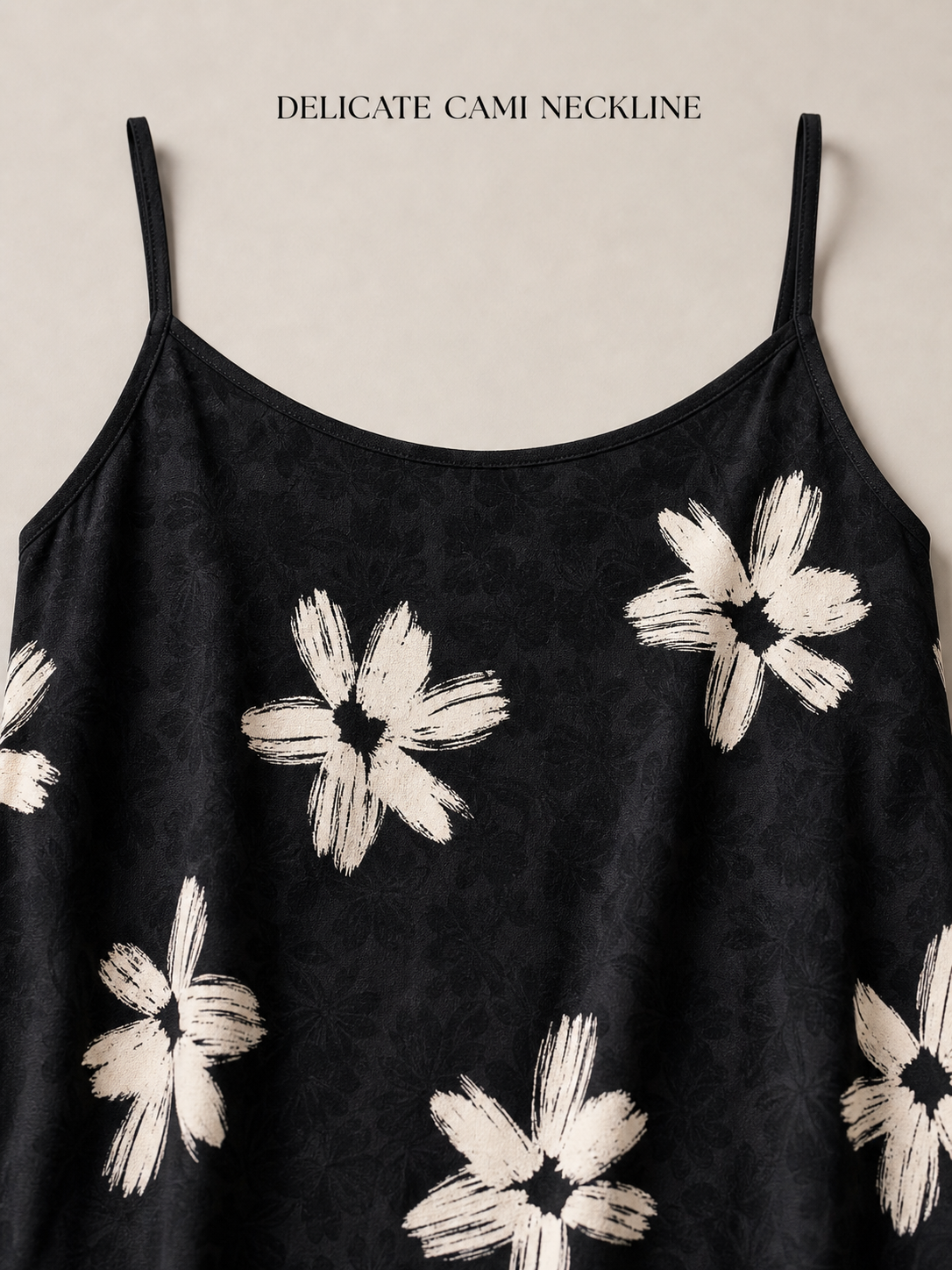 Delicate camisole scoop neckline and strap detail