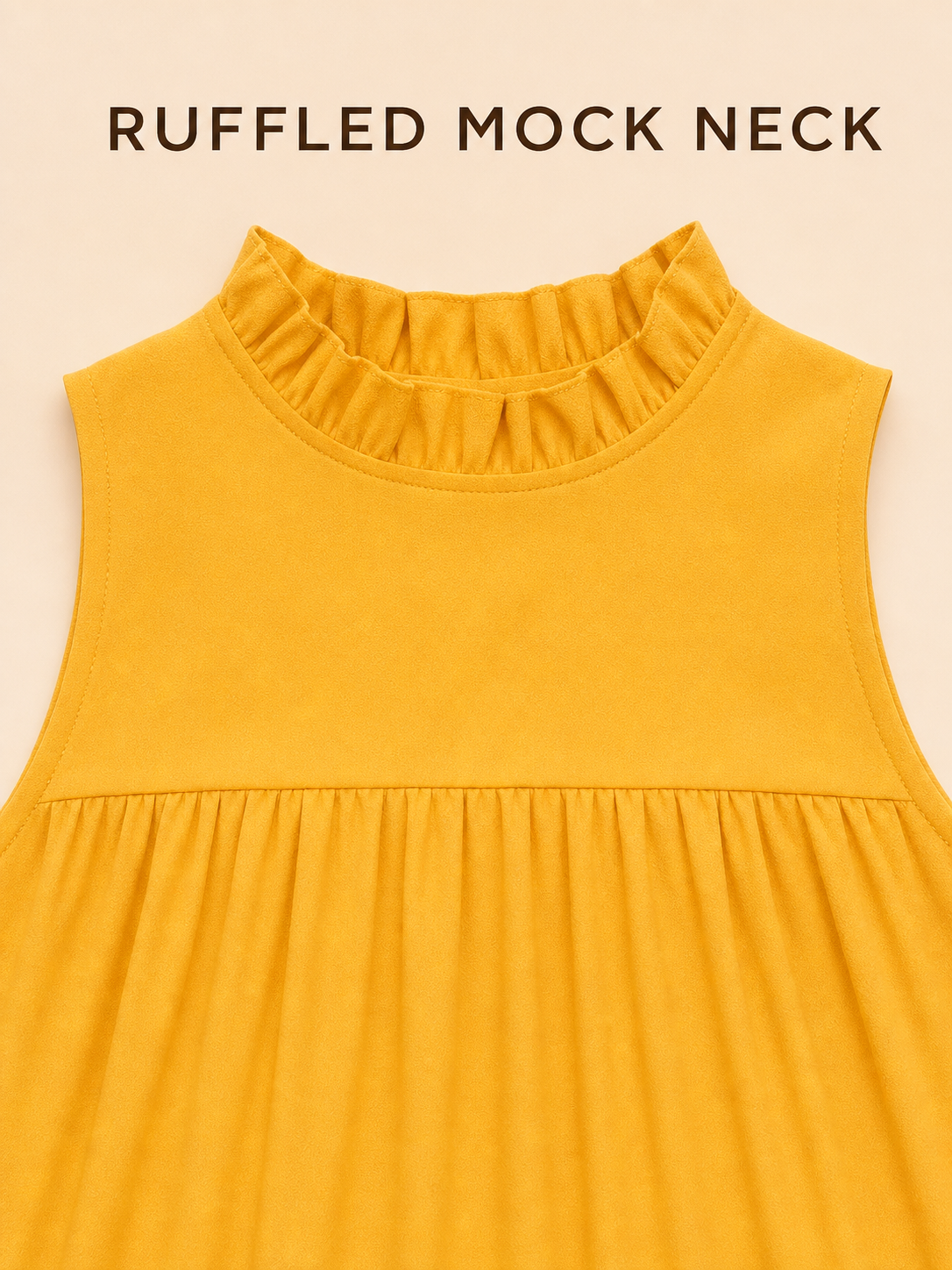 Ruffled mock neck and gathered yoke construction detail