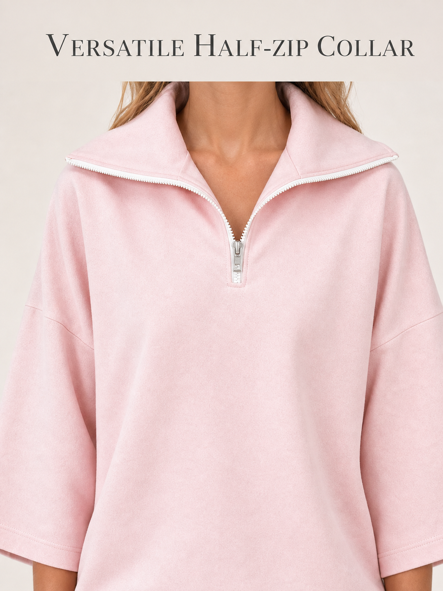 Wide pointed collar and silver quarter-zip detail