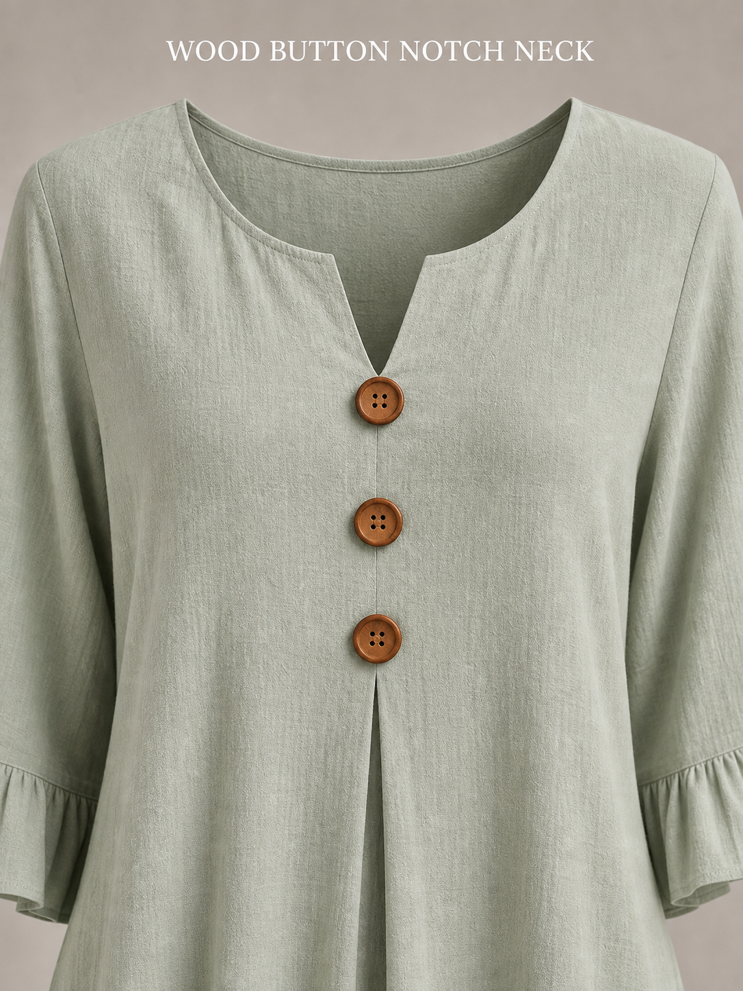 Wood-button notch neckline and center pleat detail