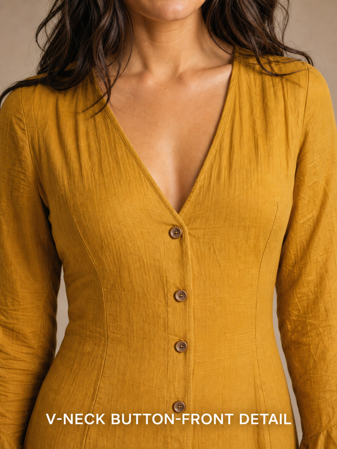 Deep V neckline and button-front placket detail