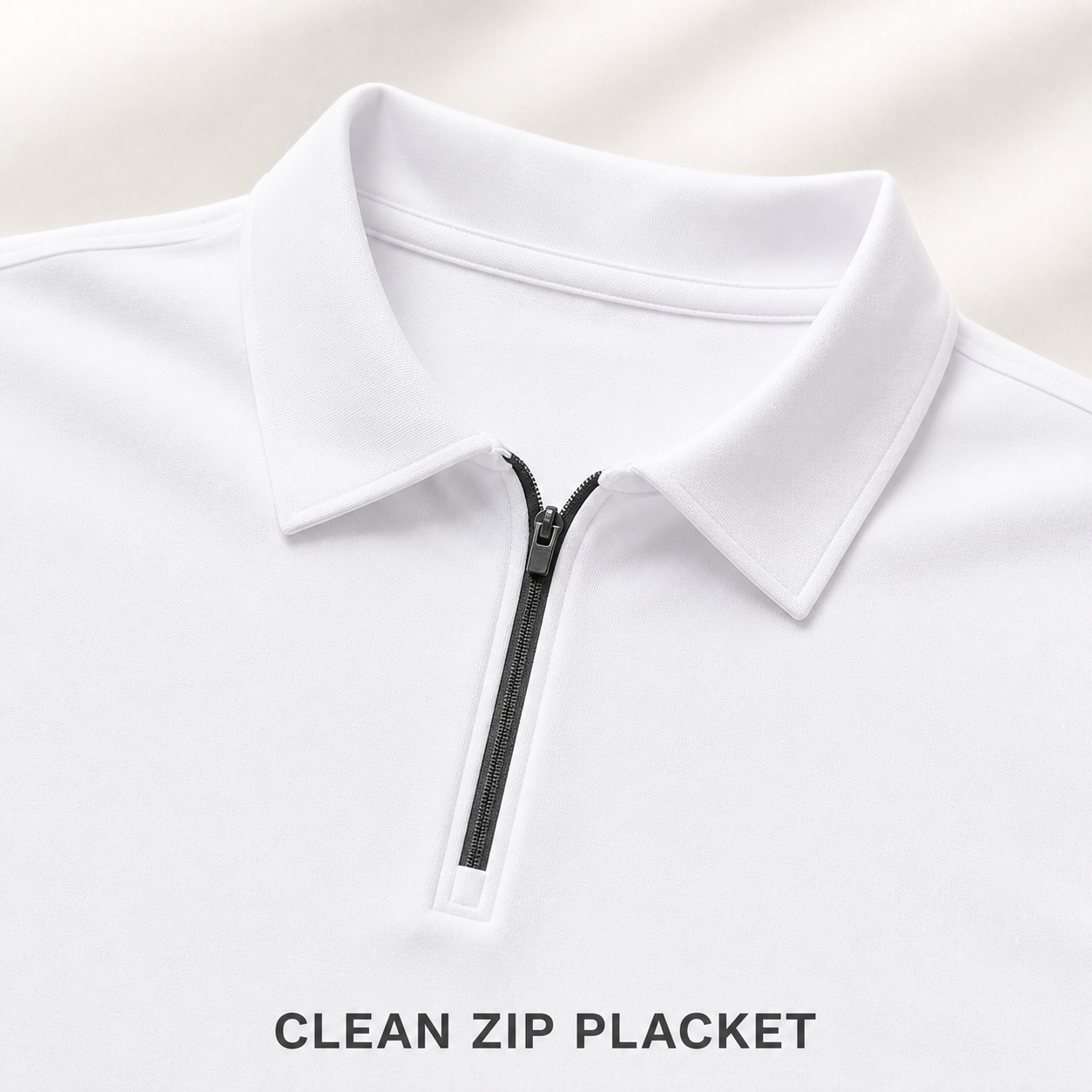 Fold down collar and clean quarter zip placket detail