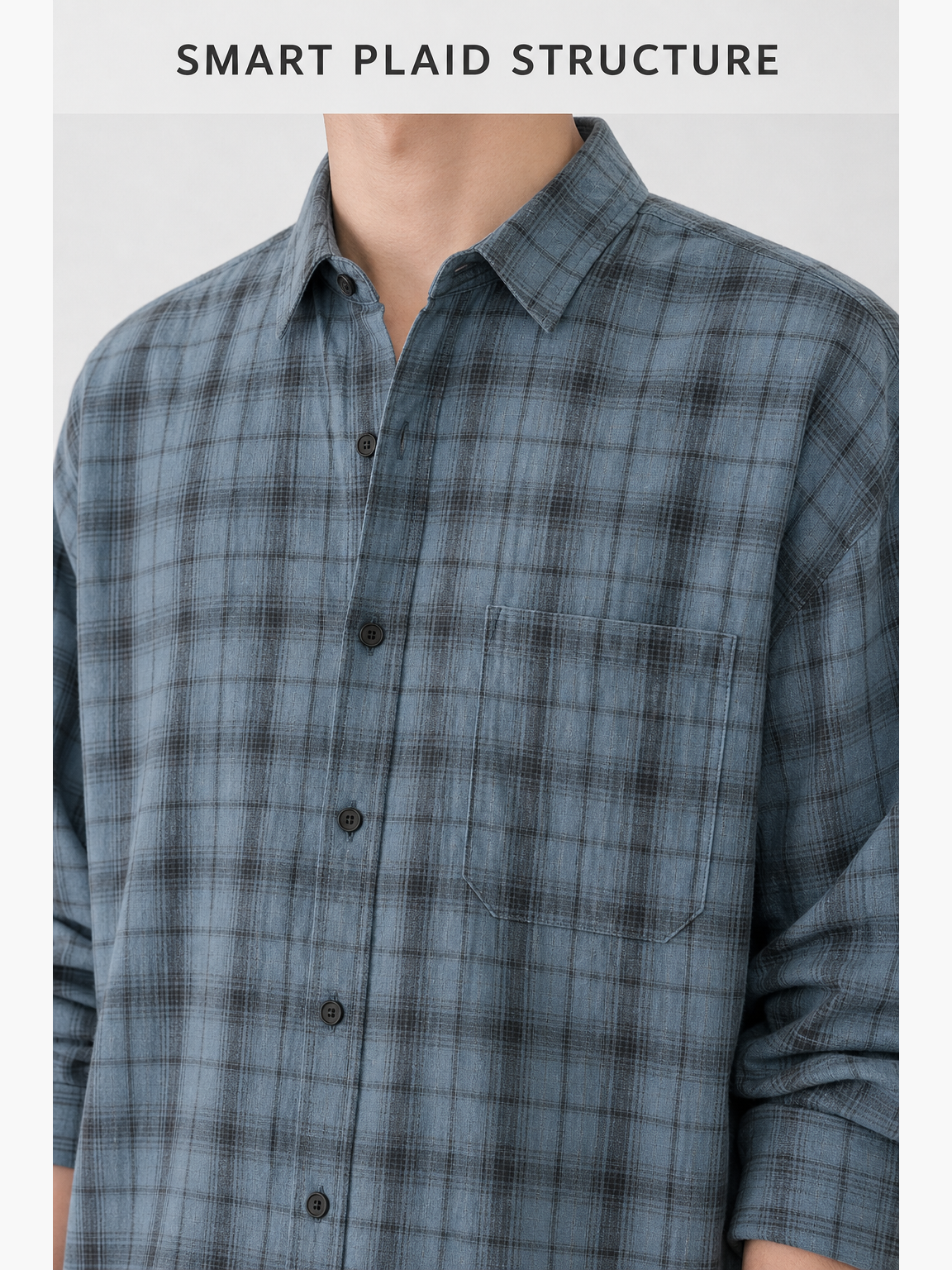 Point collar, button placket and chest pocket detail