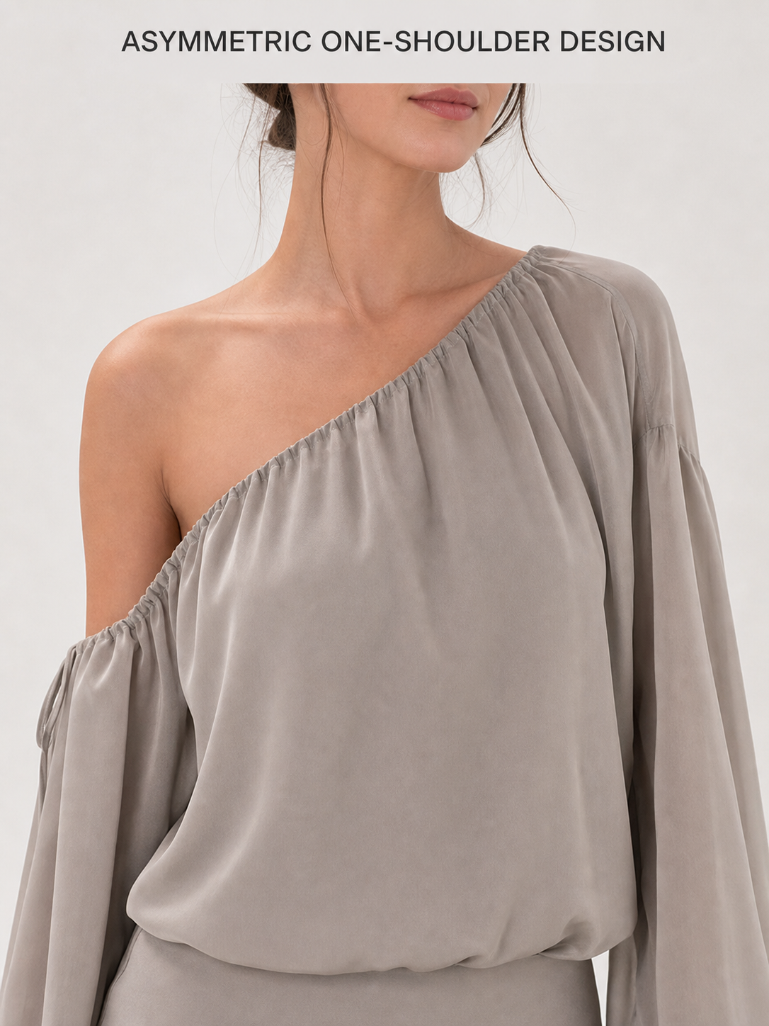 Asymmetric gathered one-shoulder neckline detail