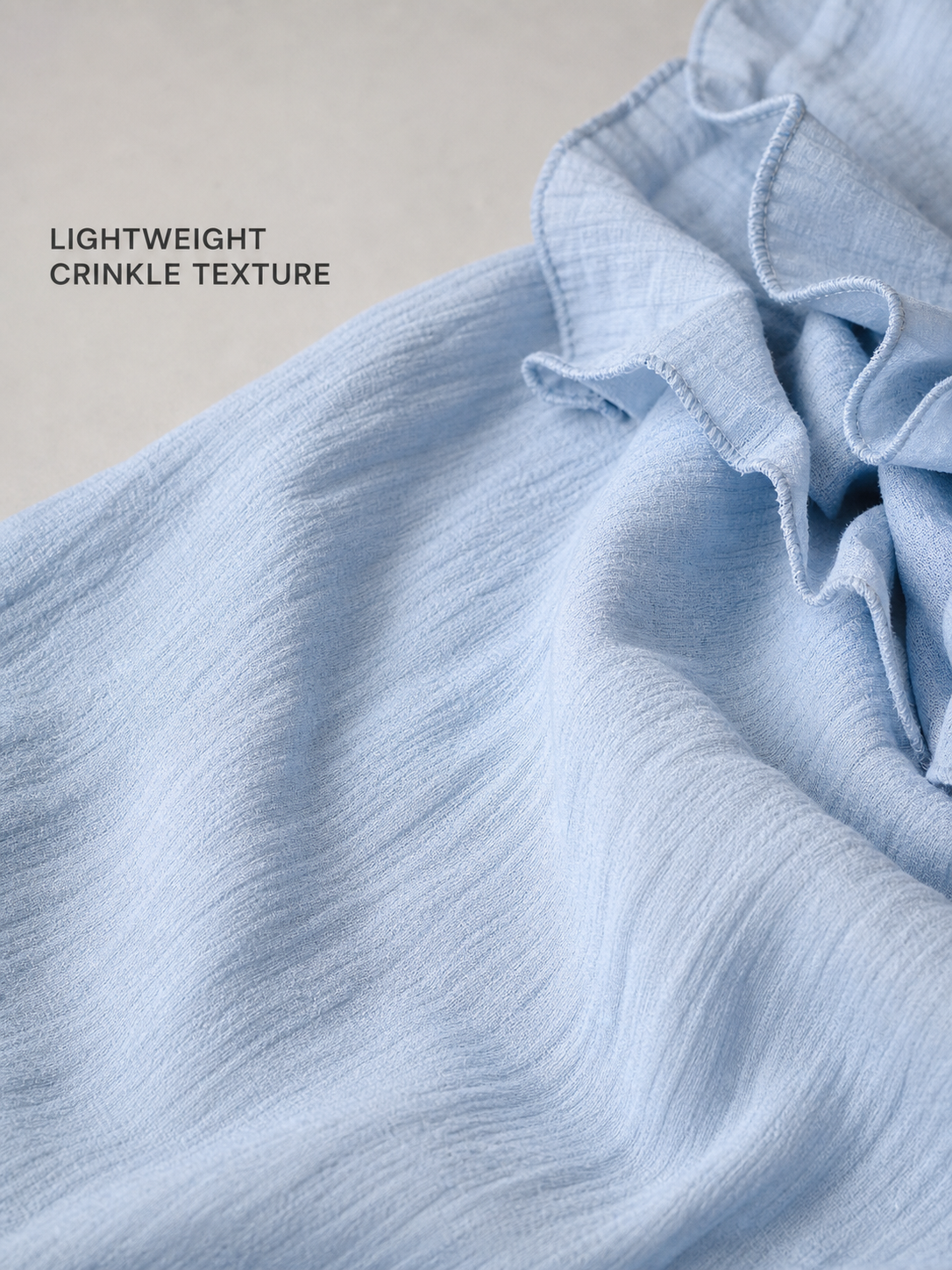 Lightweight powder blue crinkle woven texture