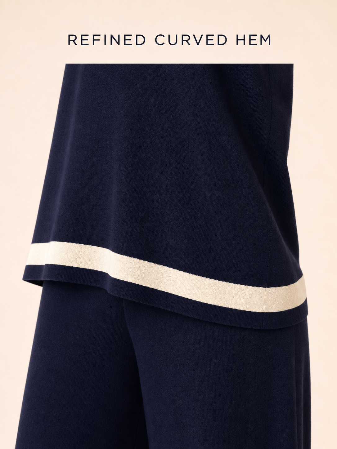 Refined metal snap hardware and stitching detail