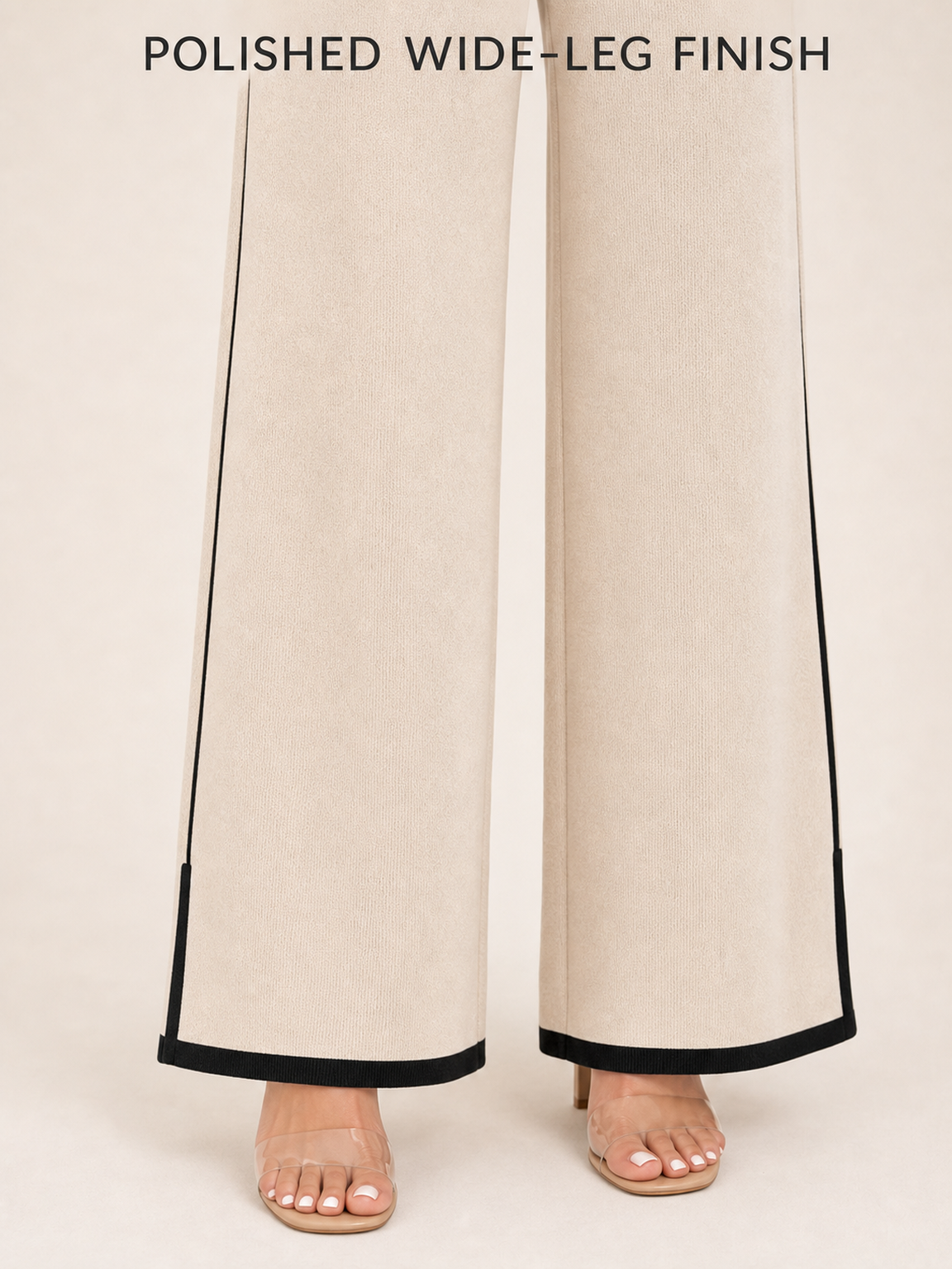 Black piped wide leg trouser and bordered hem detail