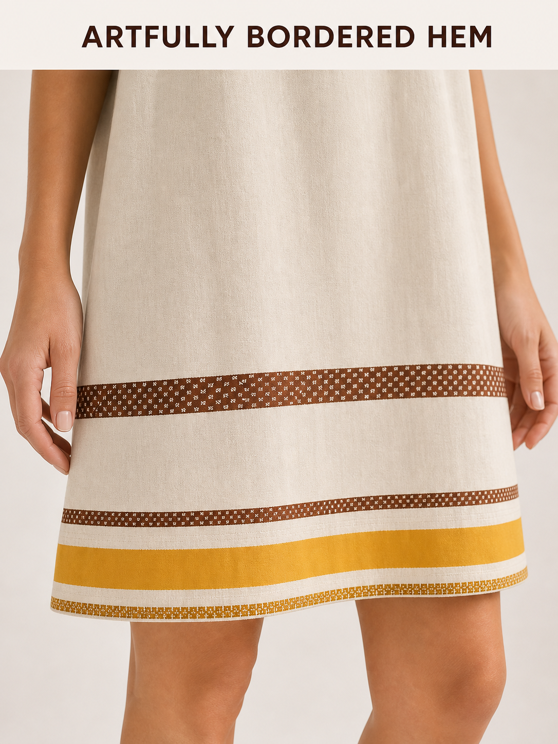 Geometric bordered kaftan hem craftsmanship