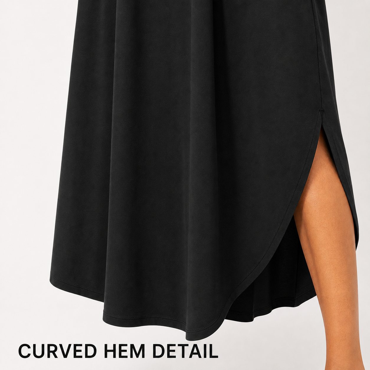 Curved handkerchief hem and side-opening finish detail