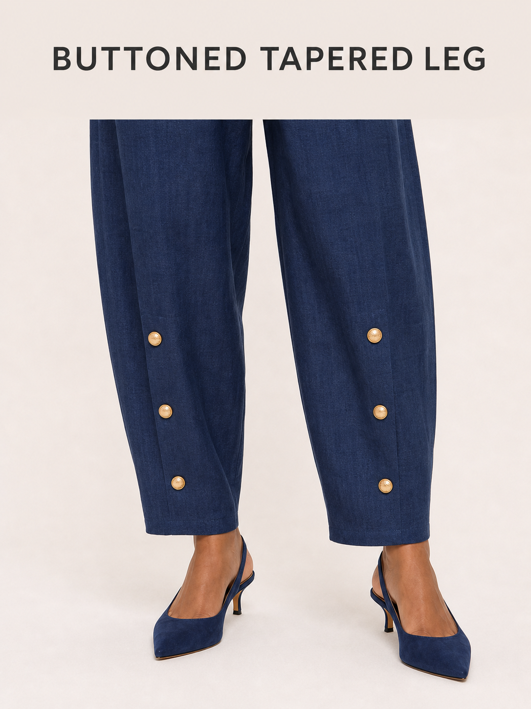 Three-button tapered trouser leg craftsmanship