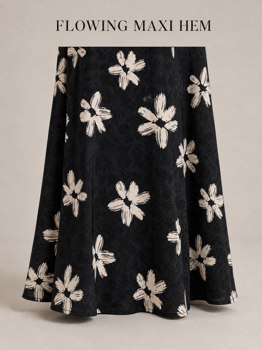 Flowing curved maxi dress hem detail