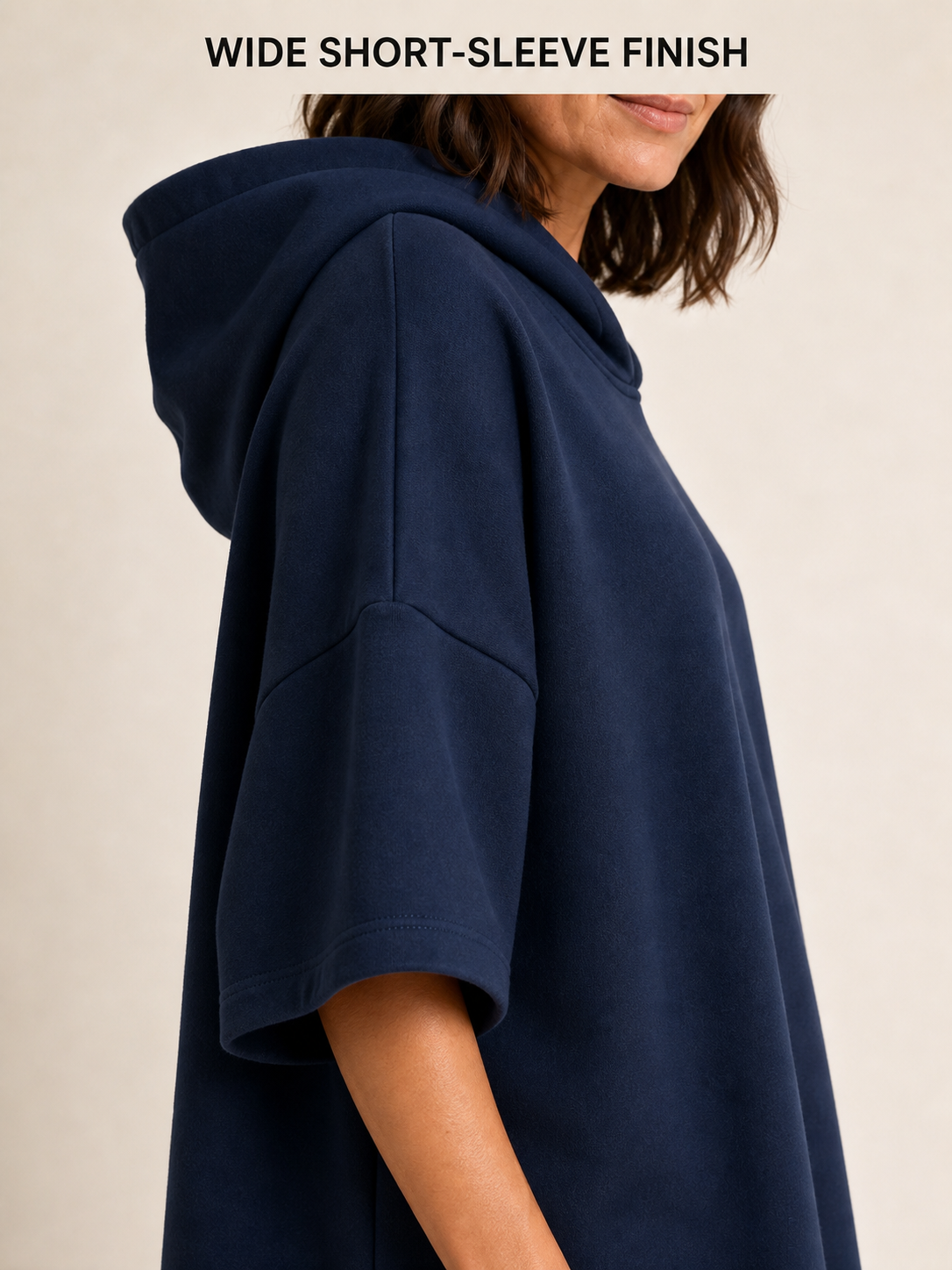 Wide elbow-length short sleeve and clean hem finish