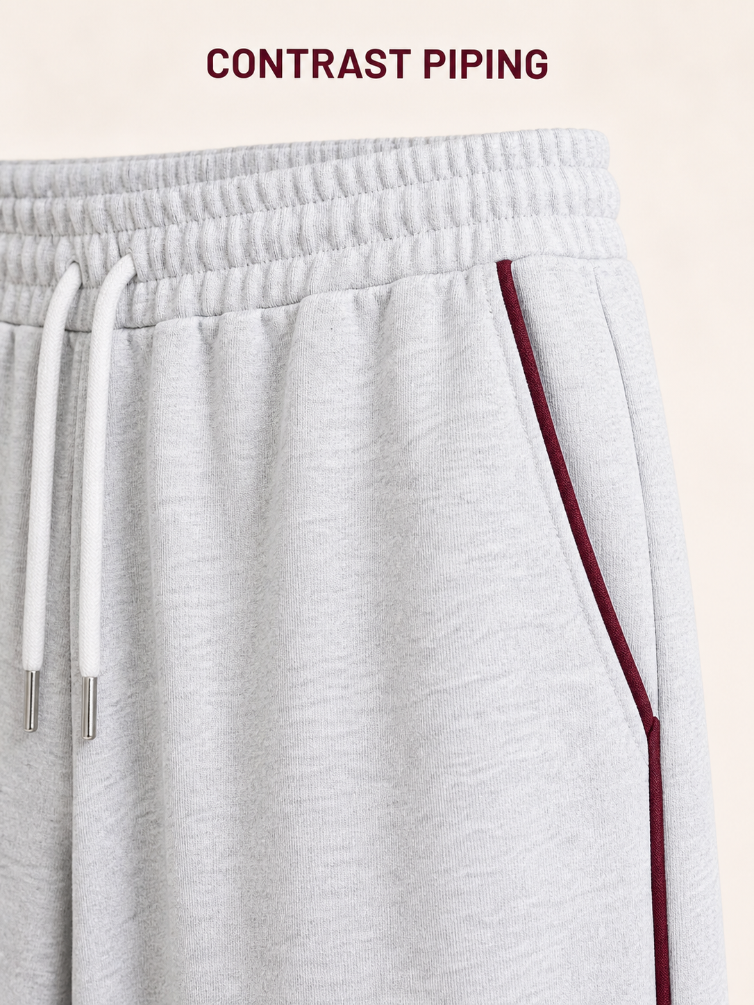 Elastic drawstring waist pocket and contrast piping detail
