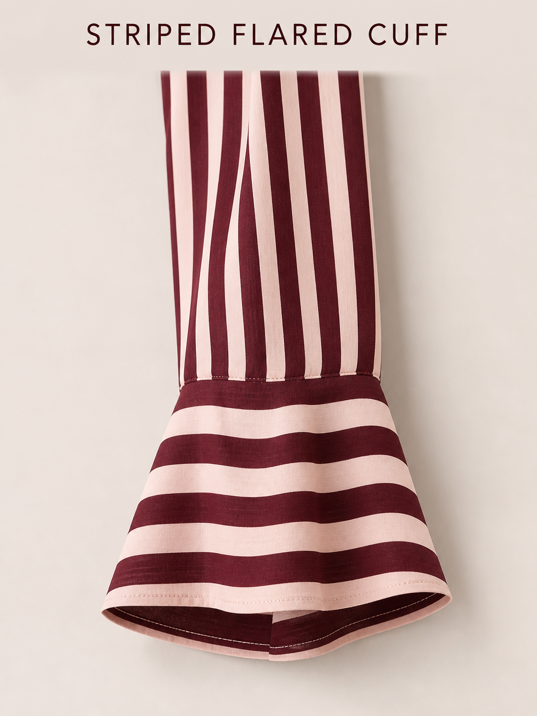 Striped wide flared cuff detail