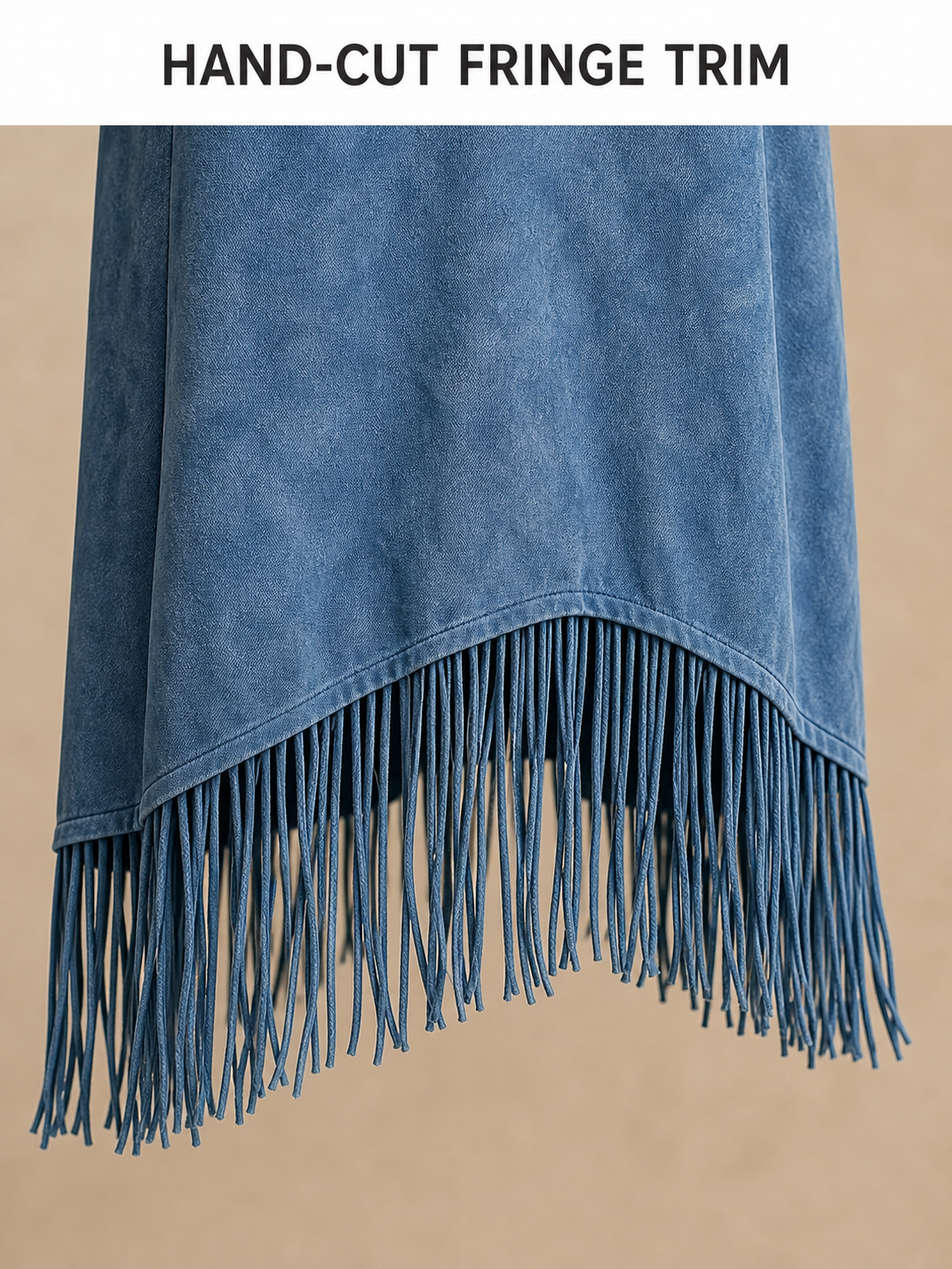 Curved hem seam and long fringe trim craftsmanship detail