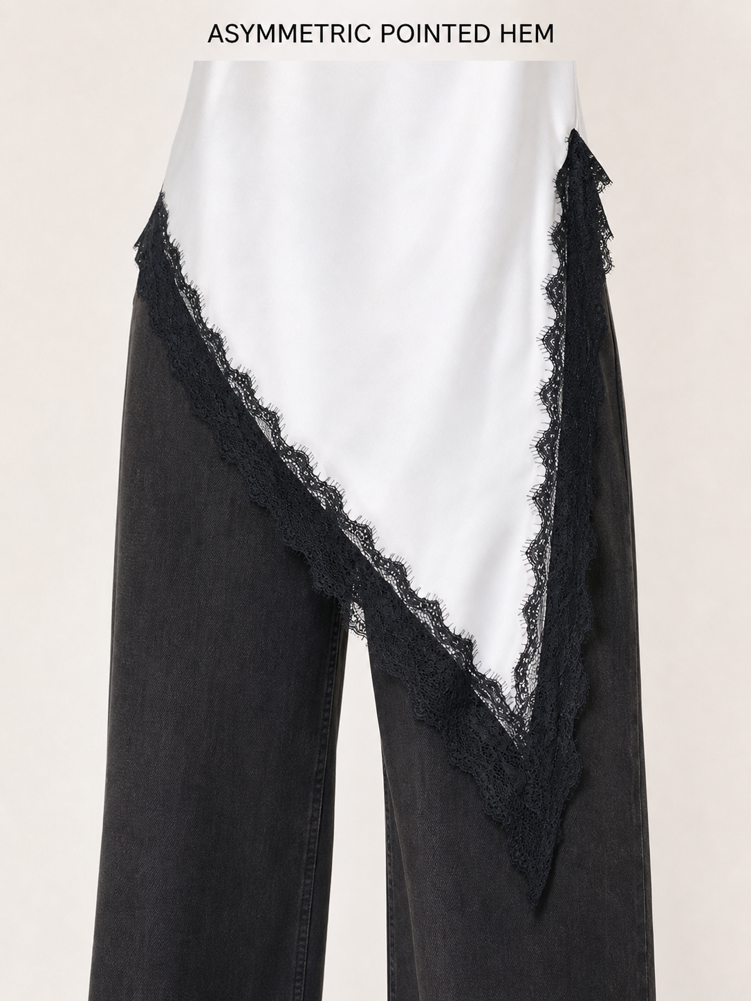 Asymmetric pointed hem and contrast panel detail