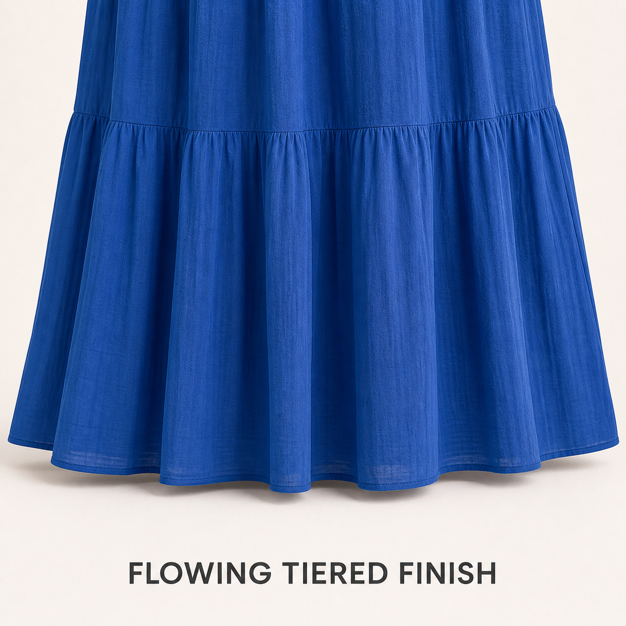 Flowing gathered tier and finished maxi hem detail