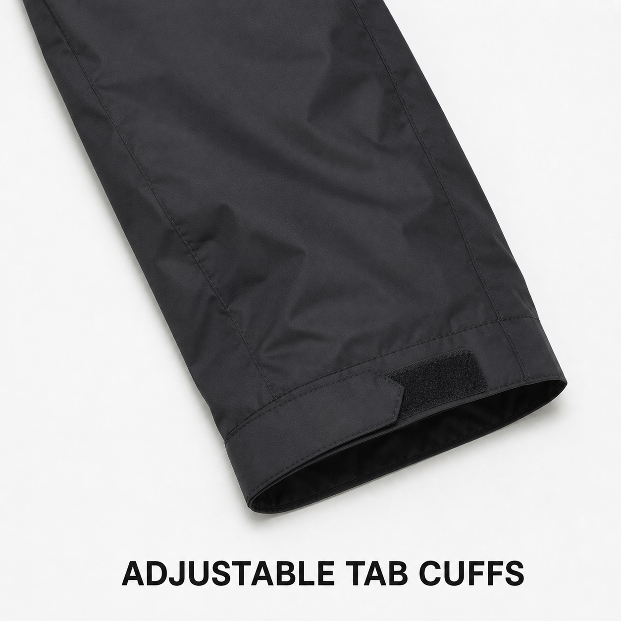 Adjustable tab cuff construction detail