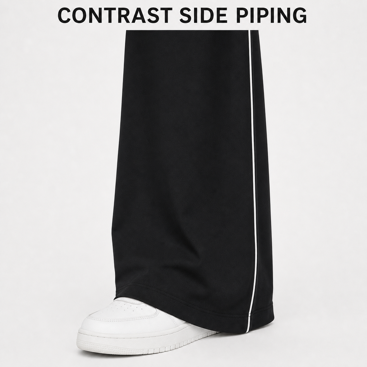 Contrast side piping and broad wide-leg hem detail