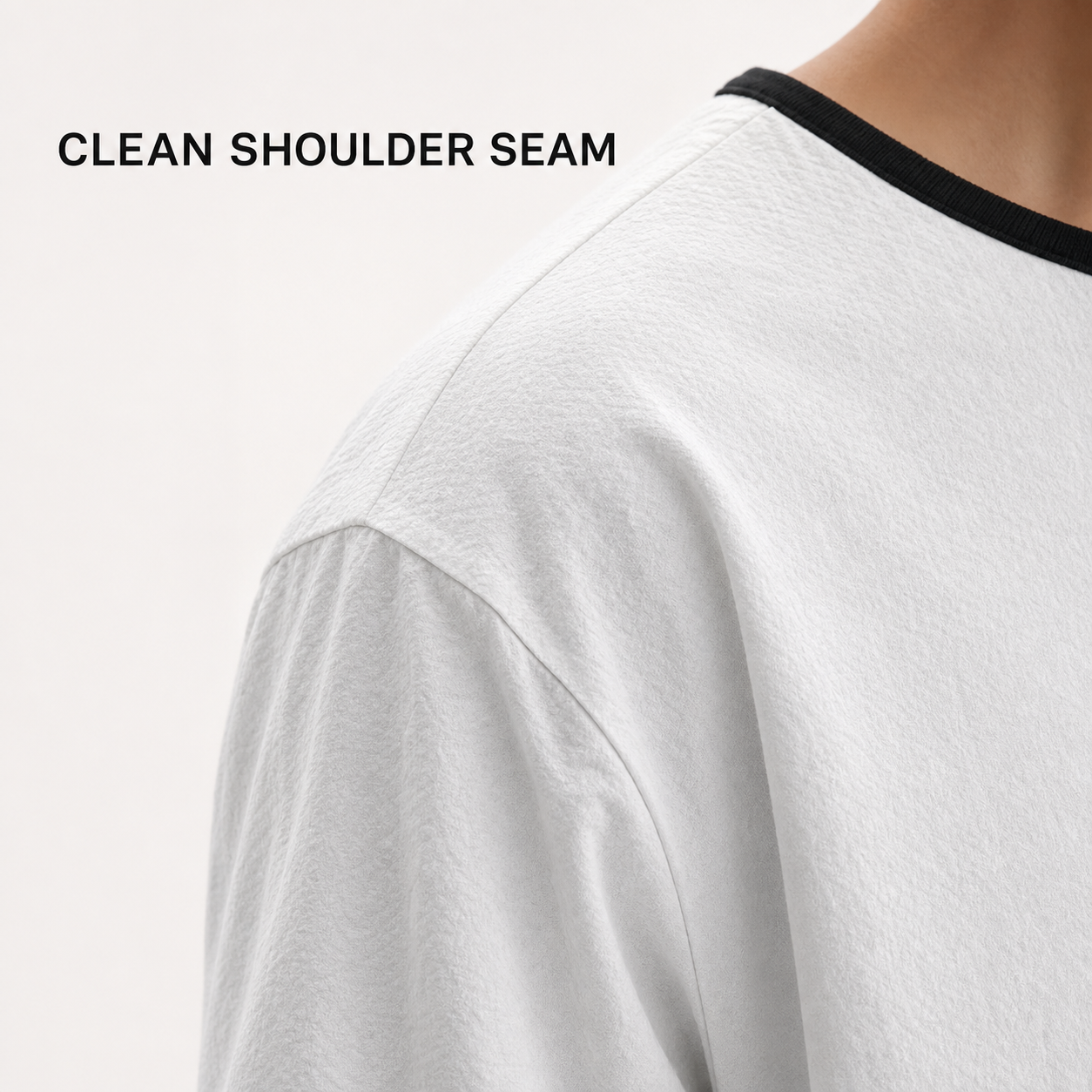 Long sleeve Henley seam and edge finishing detail
