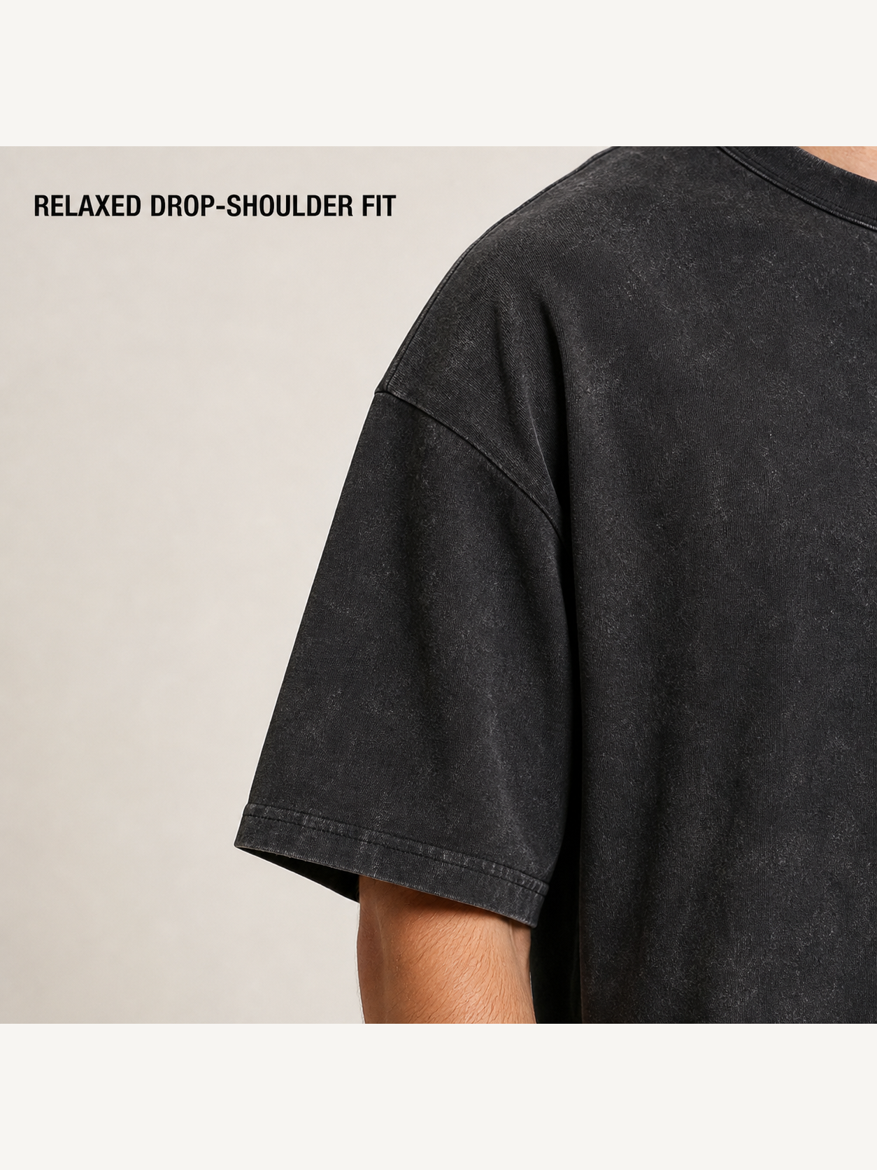 Dropped shoulder and wide short sleeve construction detail