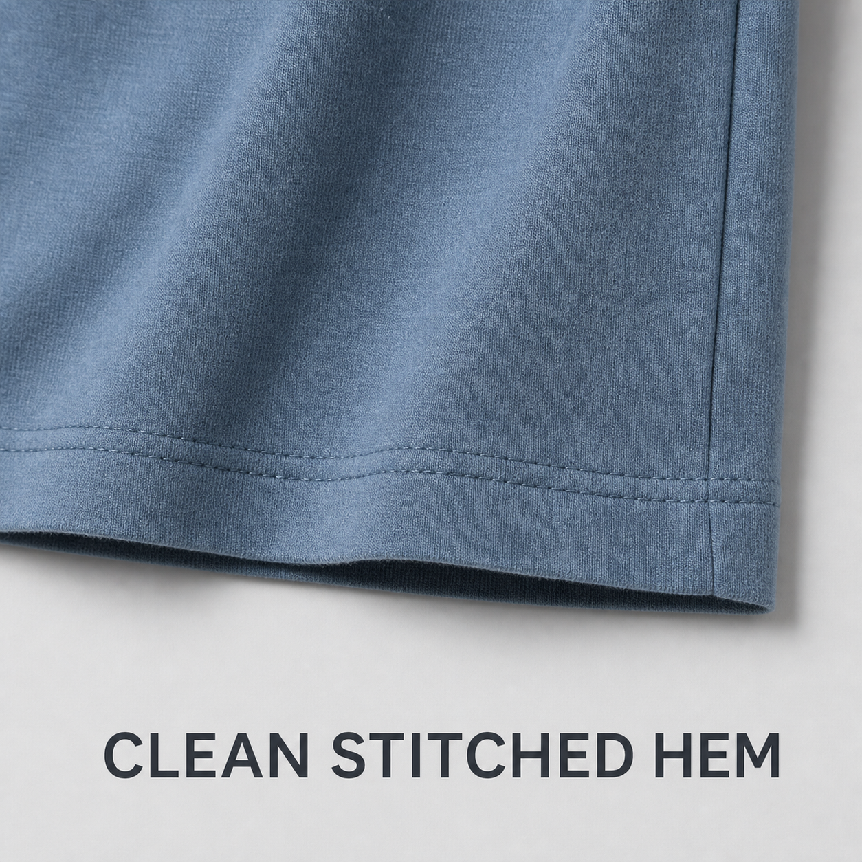 Clean stitched sleeve and hem finish detail