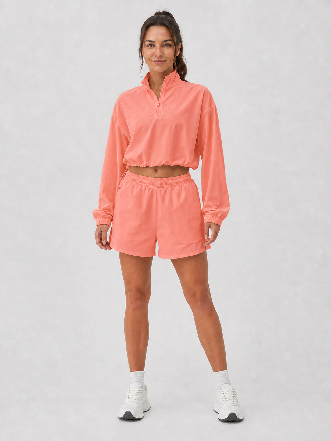 Women's coral half-zip pullover and shorts set
