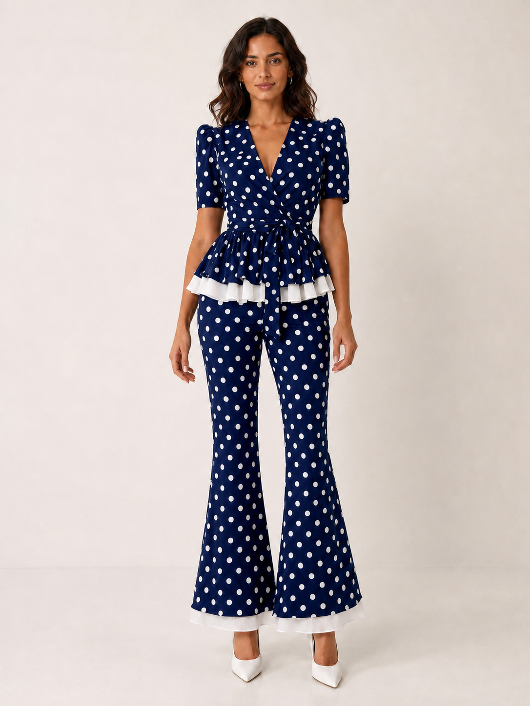 Women's navy polka dot peplum and flare pants set
