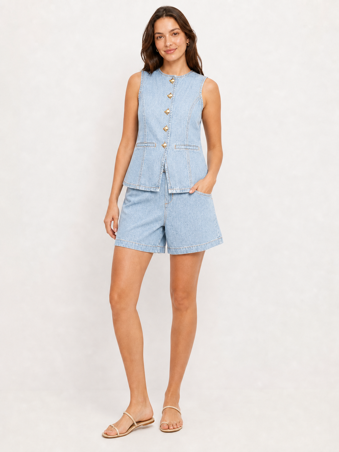 Women's light blue denim sleeveless vest and shorts set