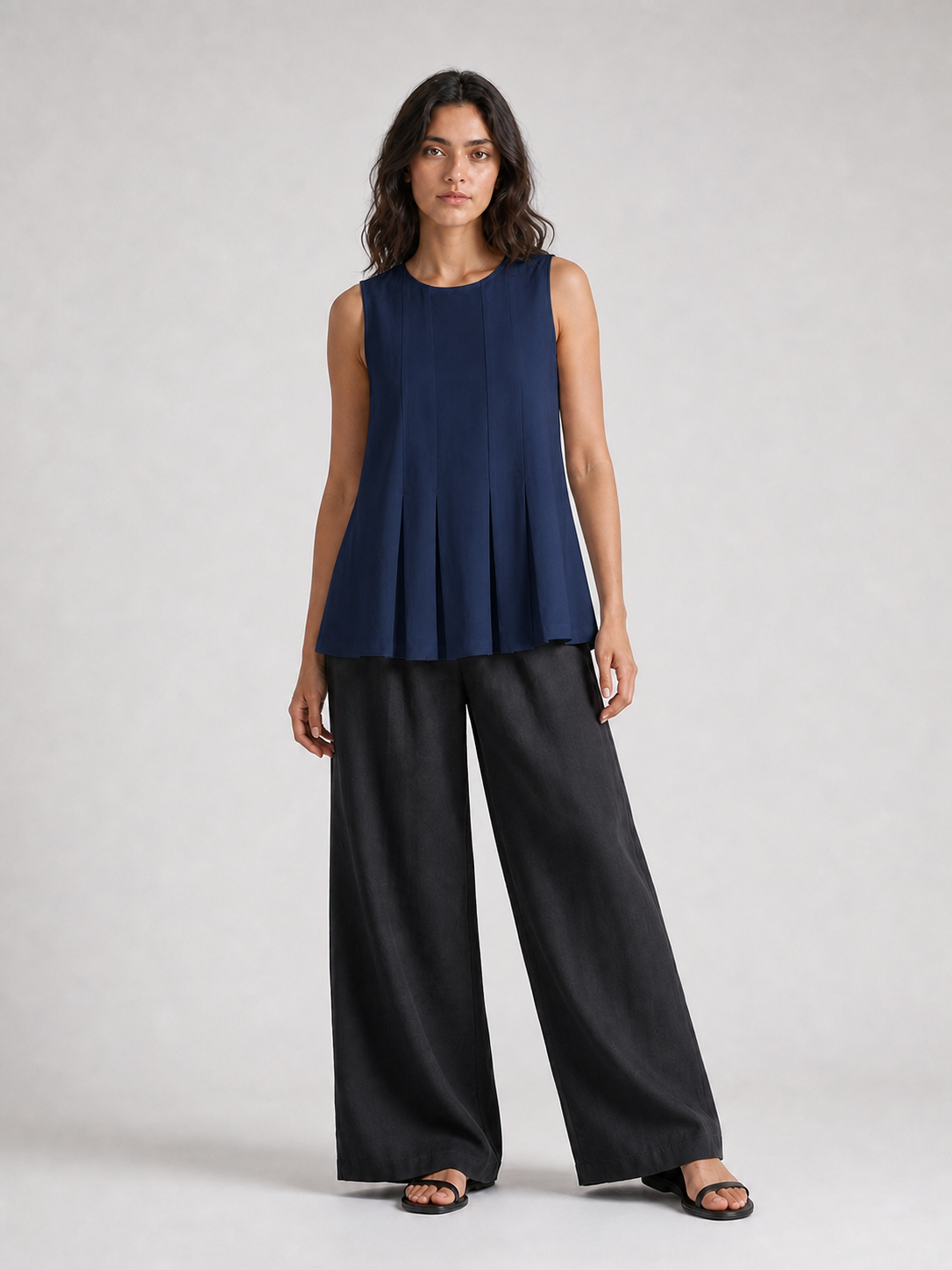 Women's navy pleated sleeveless A-line top