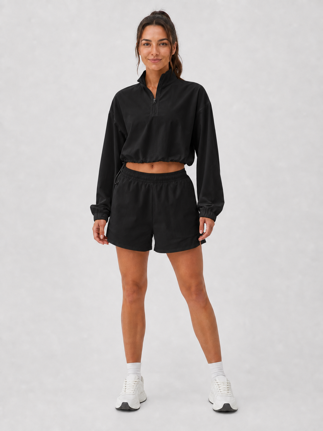 Women's black half-zip pullover and shorts set