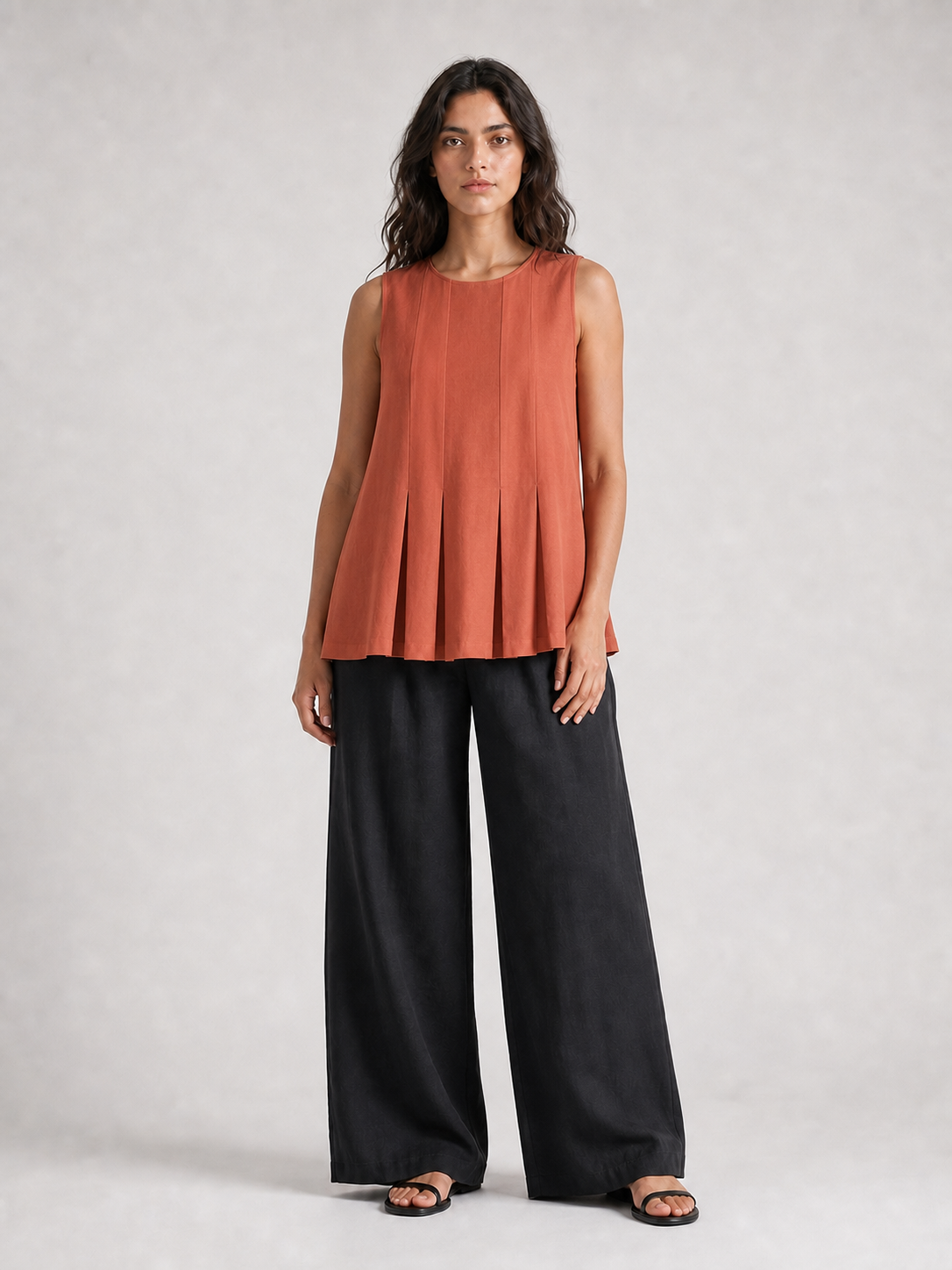 Women's terracotta pleated sleeveless A-line top