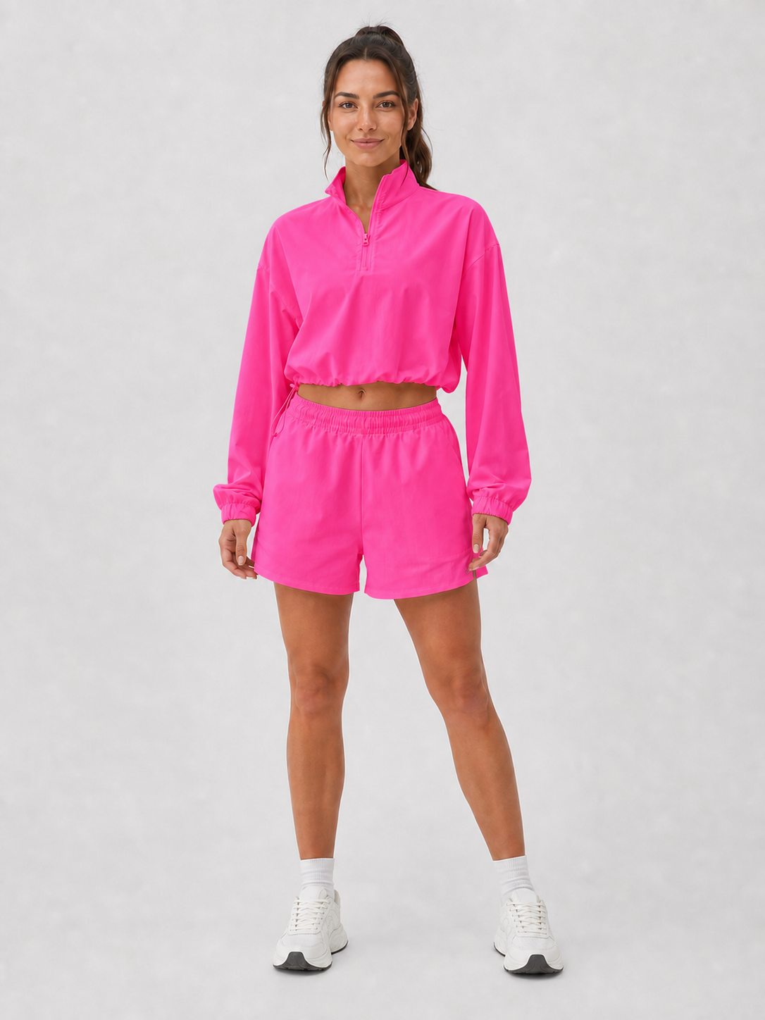 Women's hot pink half-zip pullover and shorts set