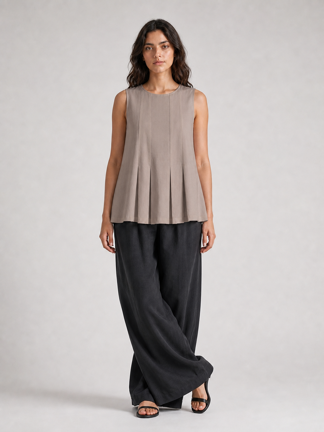 Women's warm taupe pleated sleeveless A-line top