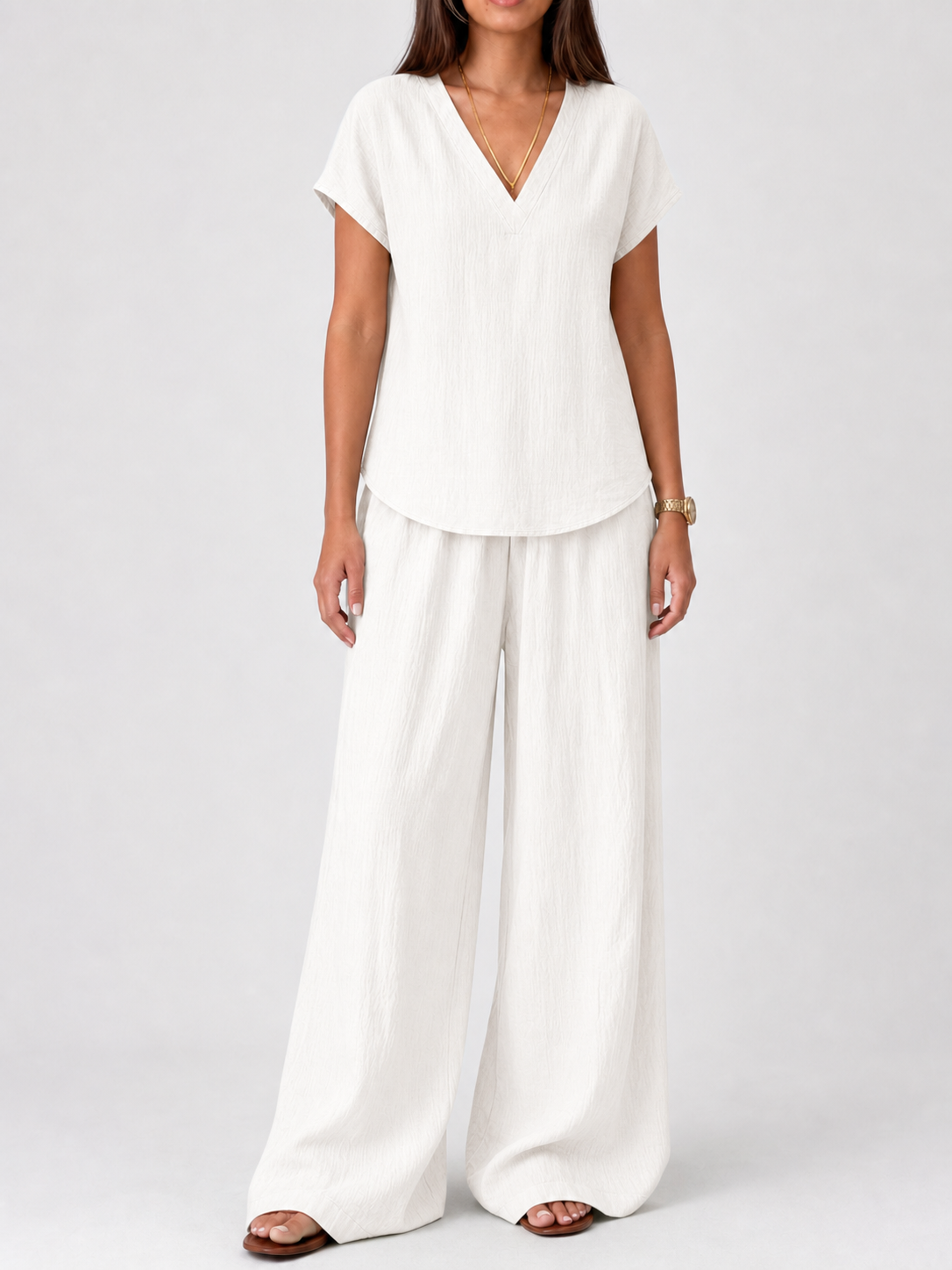 Women's soft white crinkle tunic and wide-leg pants set