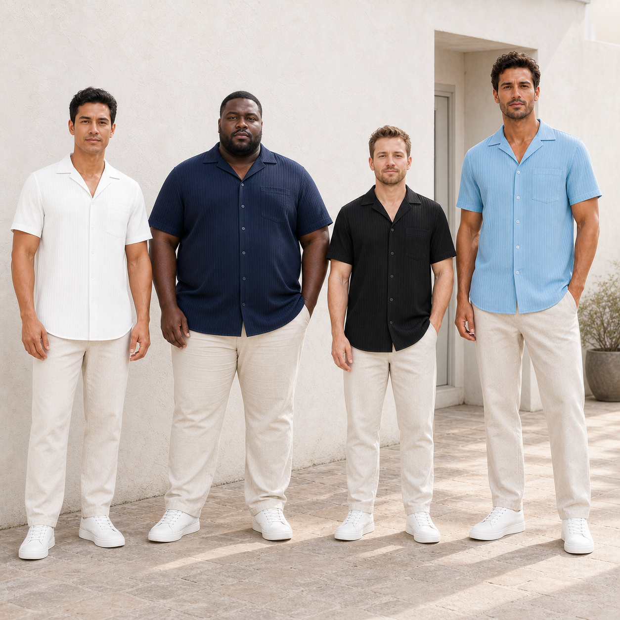 Four men wearing white navy black and sky blue shirts