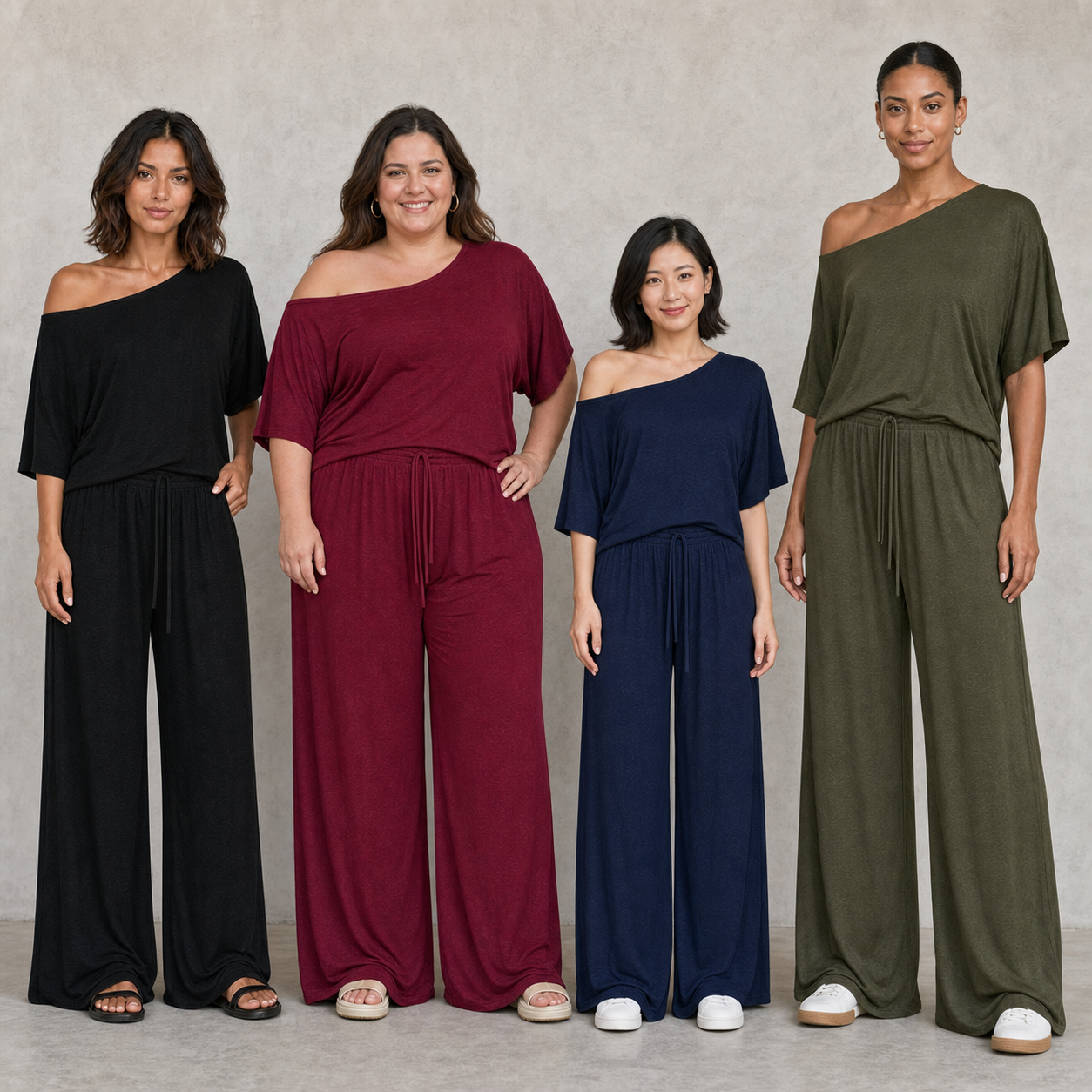 Four women wearing black burgundy navy and olive sets