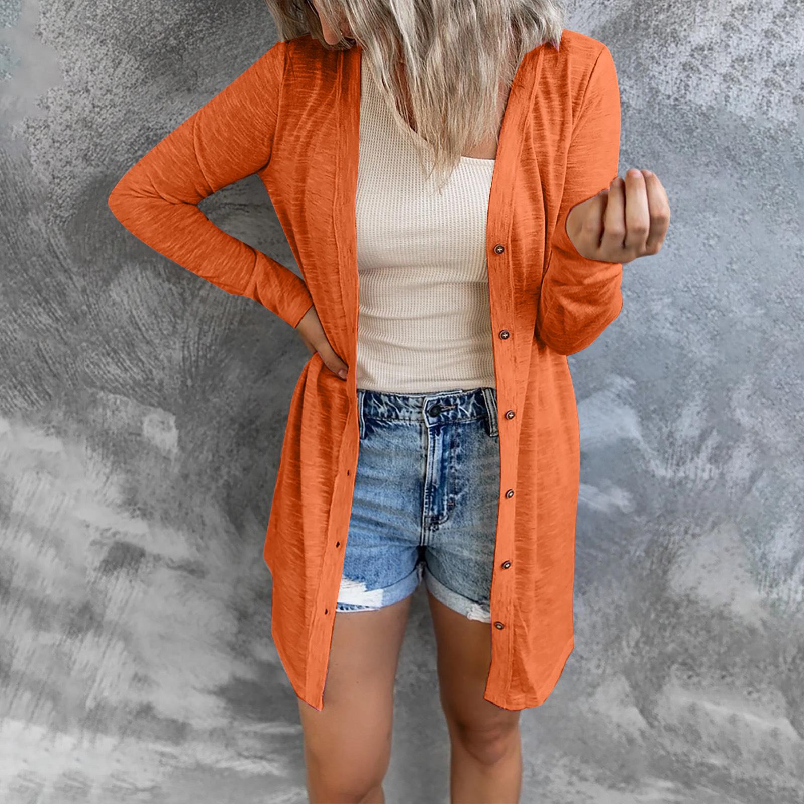 Cárdigan largo de mujer en naranja quemado con botones y bolsillos