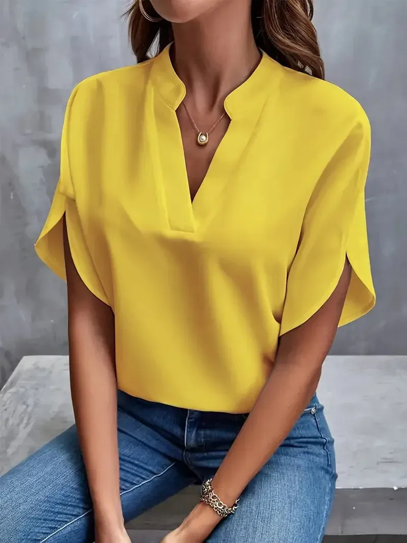 Blusa amarillo sol de mujer con cuello abierto y mangas tulipán
