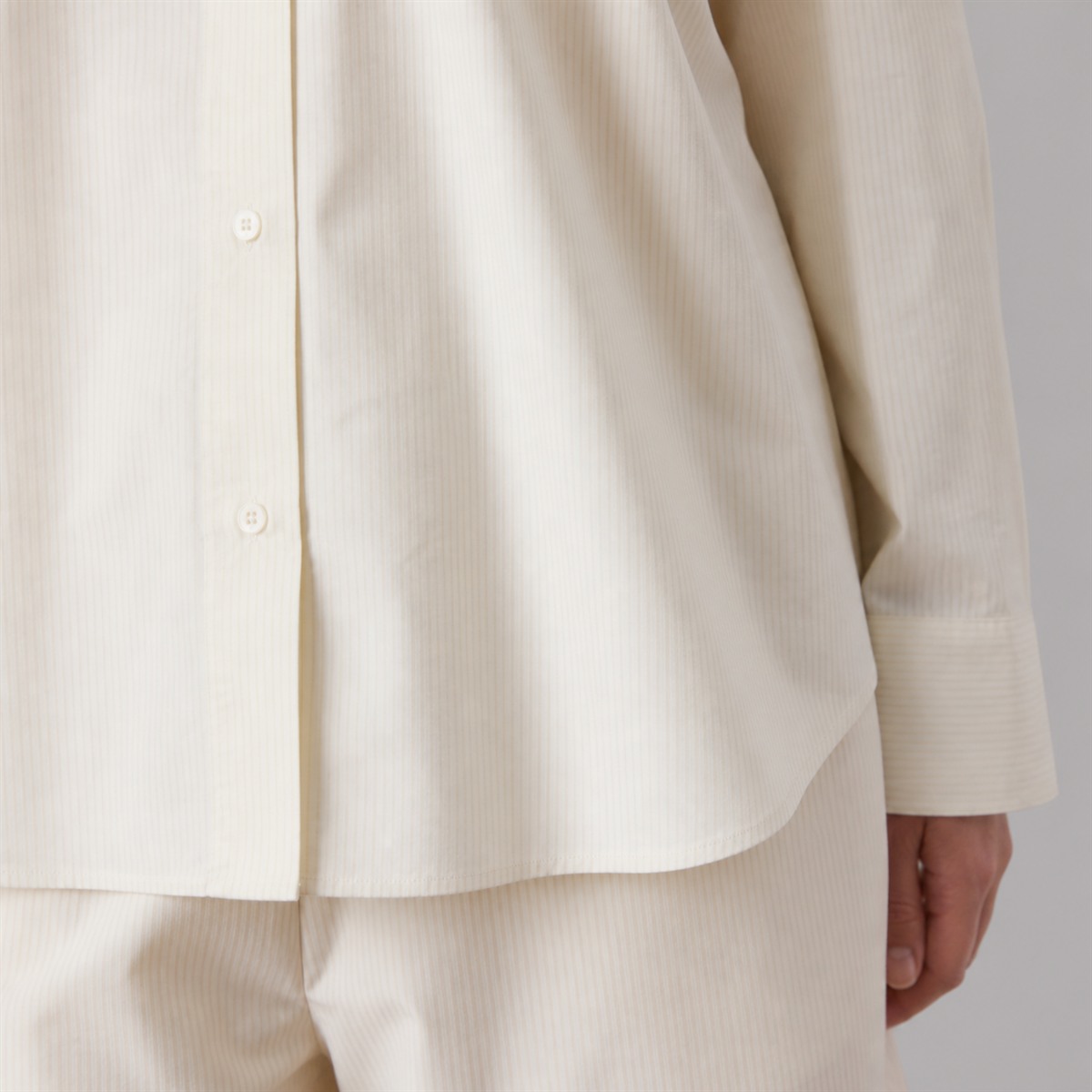 Détail du coton et de la patte de boutonnage