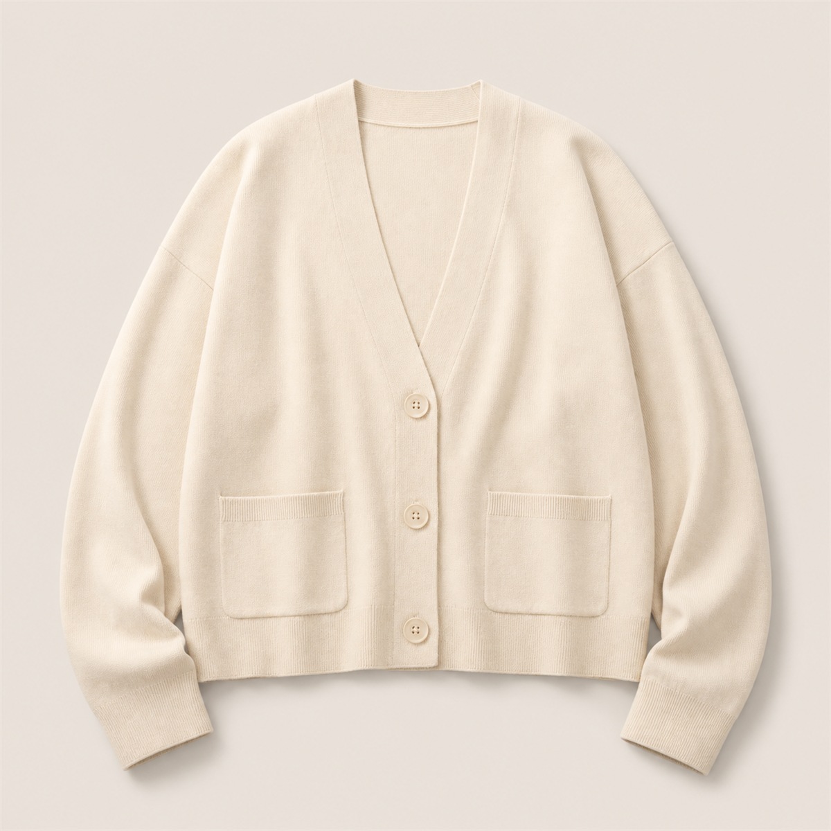 Cardigan nude en coton doux à col V — vue de face