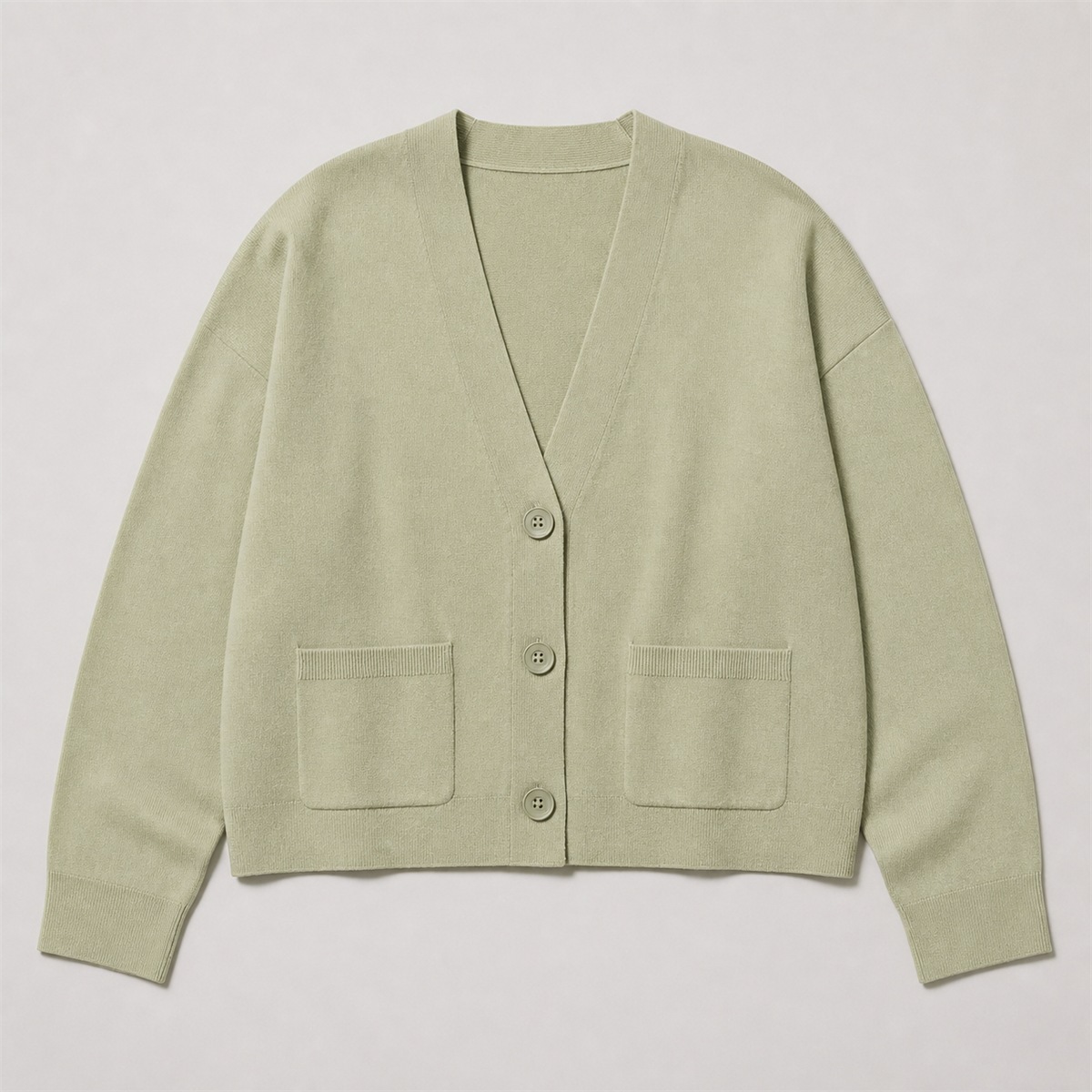 Cardigan vert en coton doux à col V — vue de face