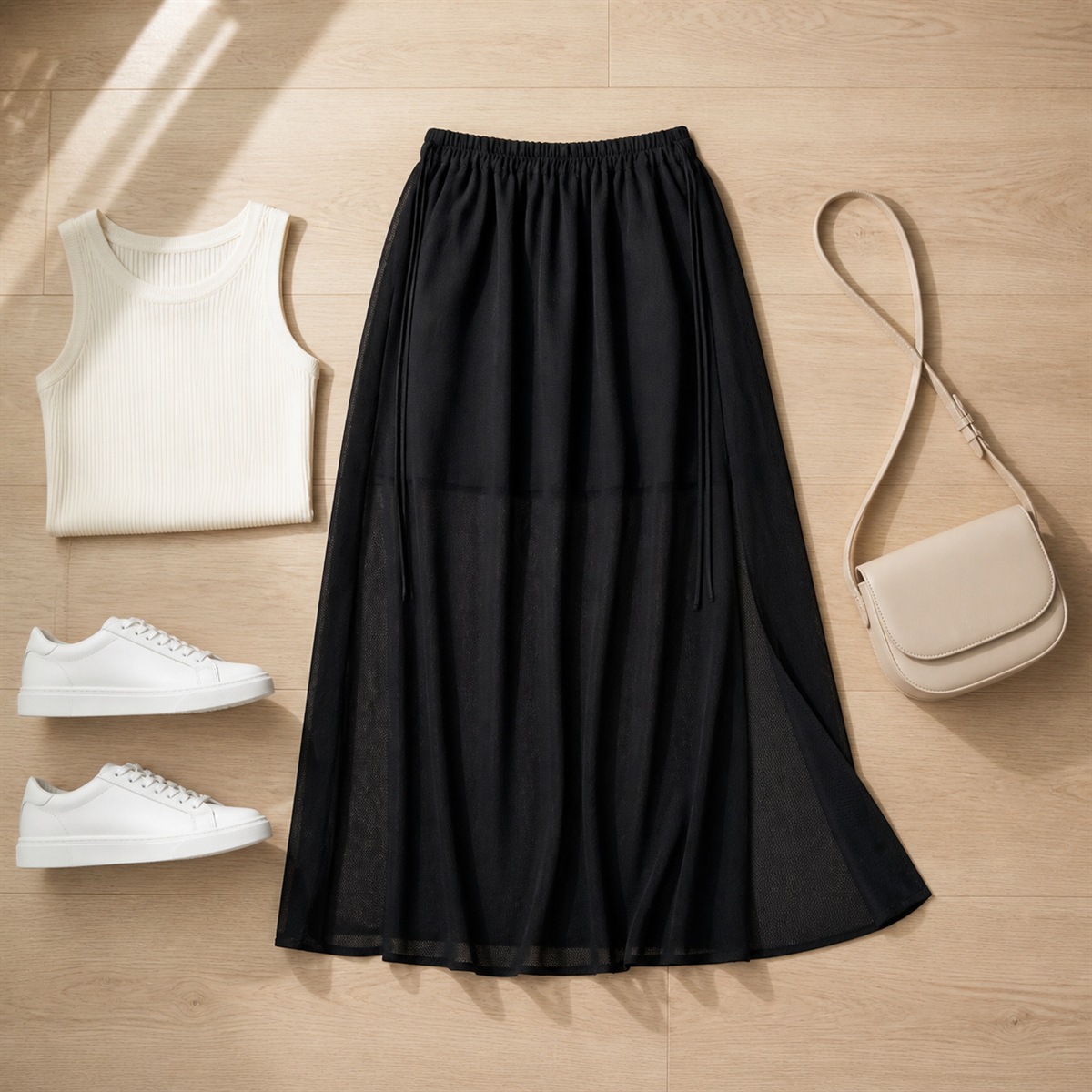 Tenue décontractée avec jupe longue noire en mesh