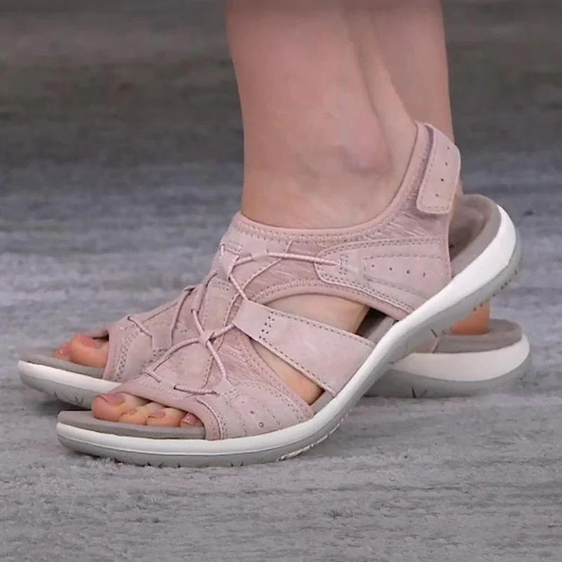 Sandalias rosas vista lateral